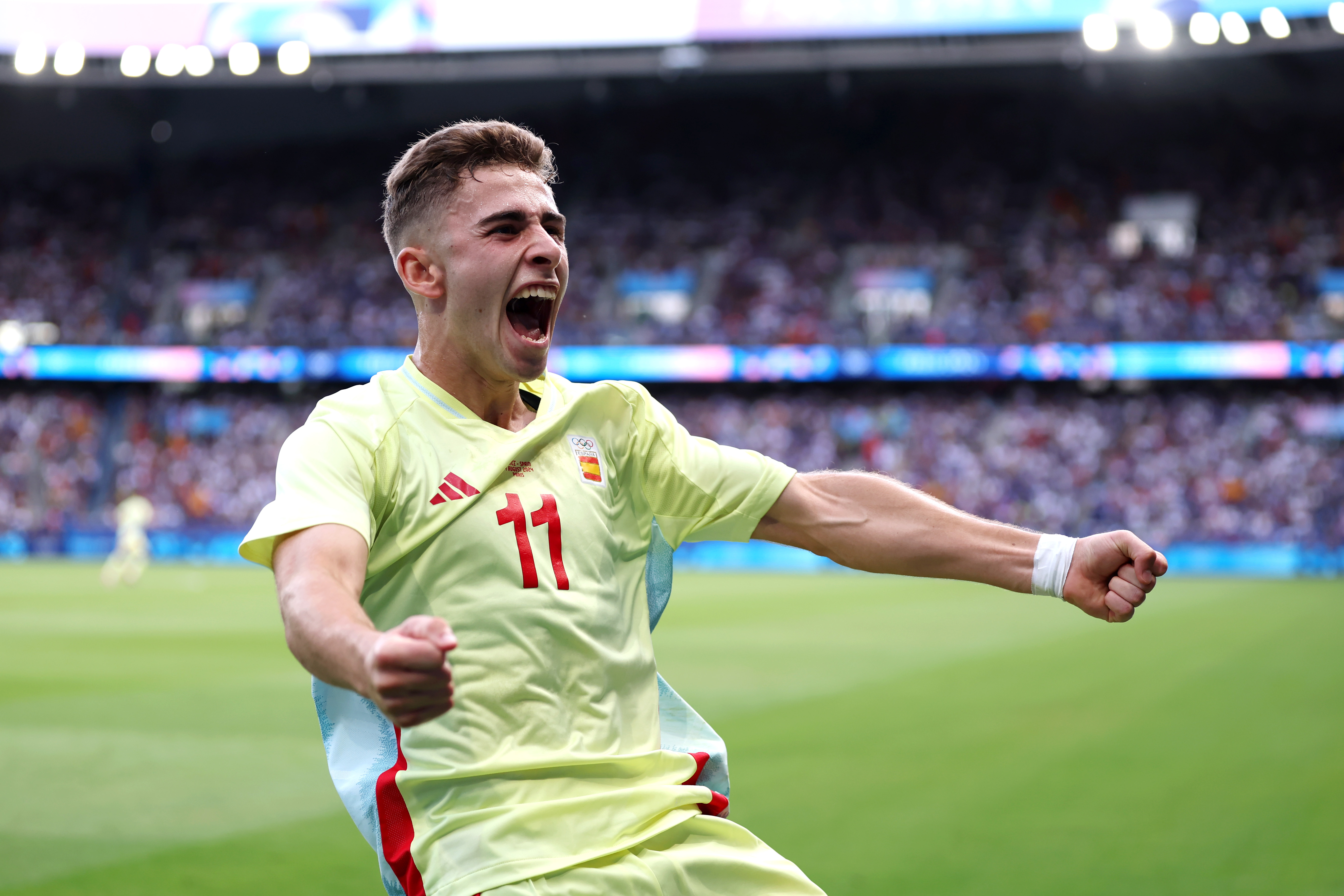 PARIS, FRANCE - AUGUST 09: Fermin Lopez #11 of Team Spain celebrates scoring his team's first goal during the Men's Gold Medal match between France and Spain during the Olympic Games Paris 2024 at Parc des Princes on August 09, 2024 in Paris, France. (Photo by Alex Pantling/Getty Images)