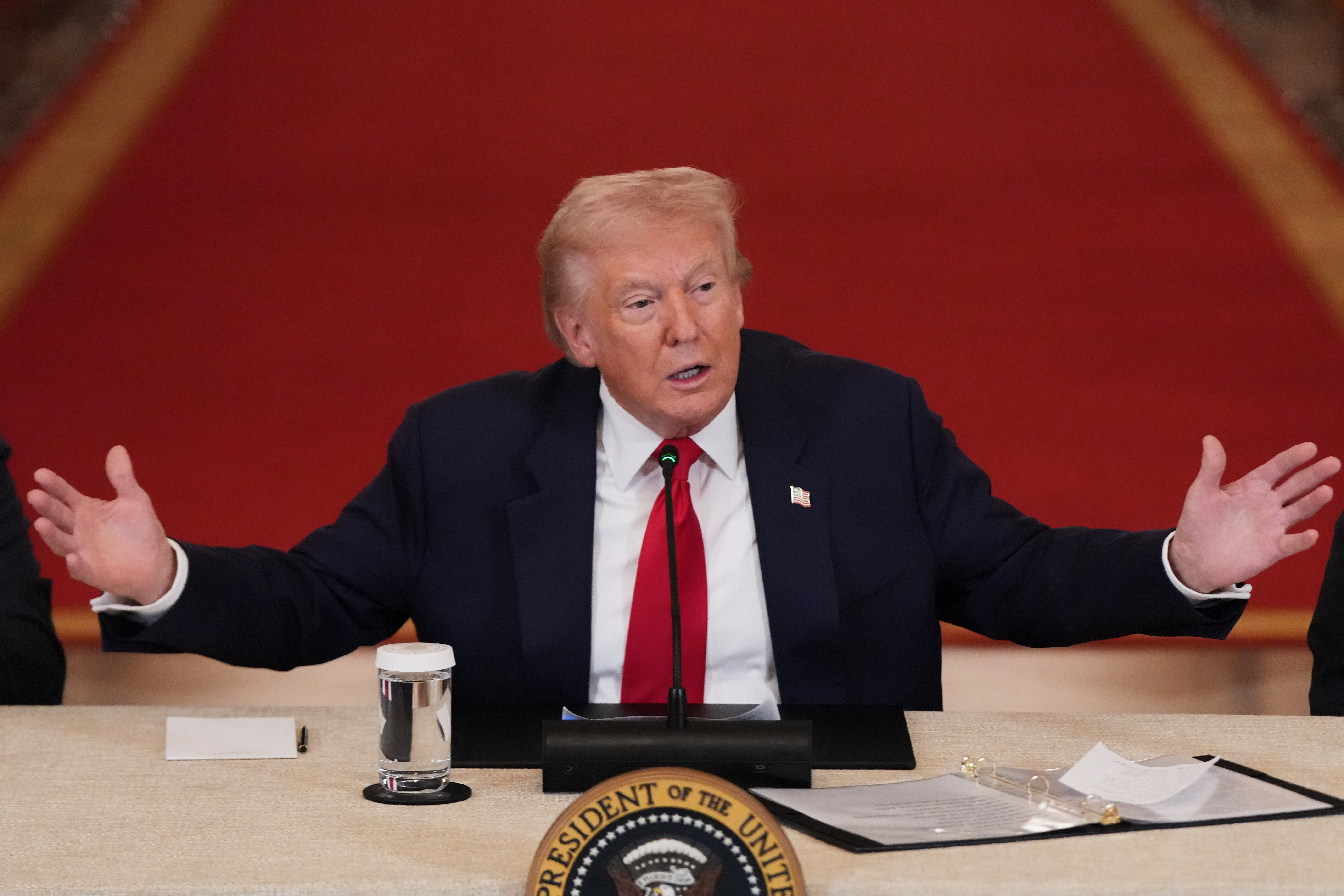 President Donald Trump speaks during a roundtable discussion on college sports in the East Room of the White House, Friday, March 6, 2026, in Washington. (AP Photo/Julia Demaree Nikhinson)