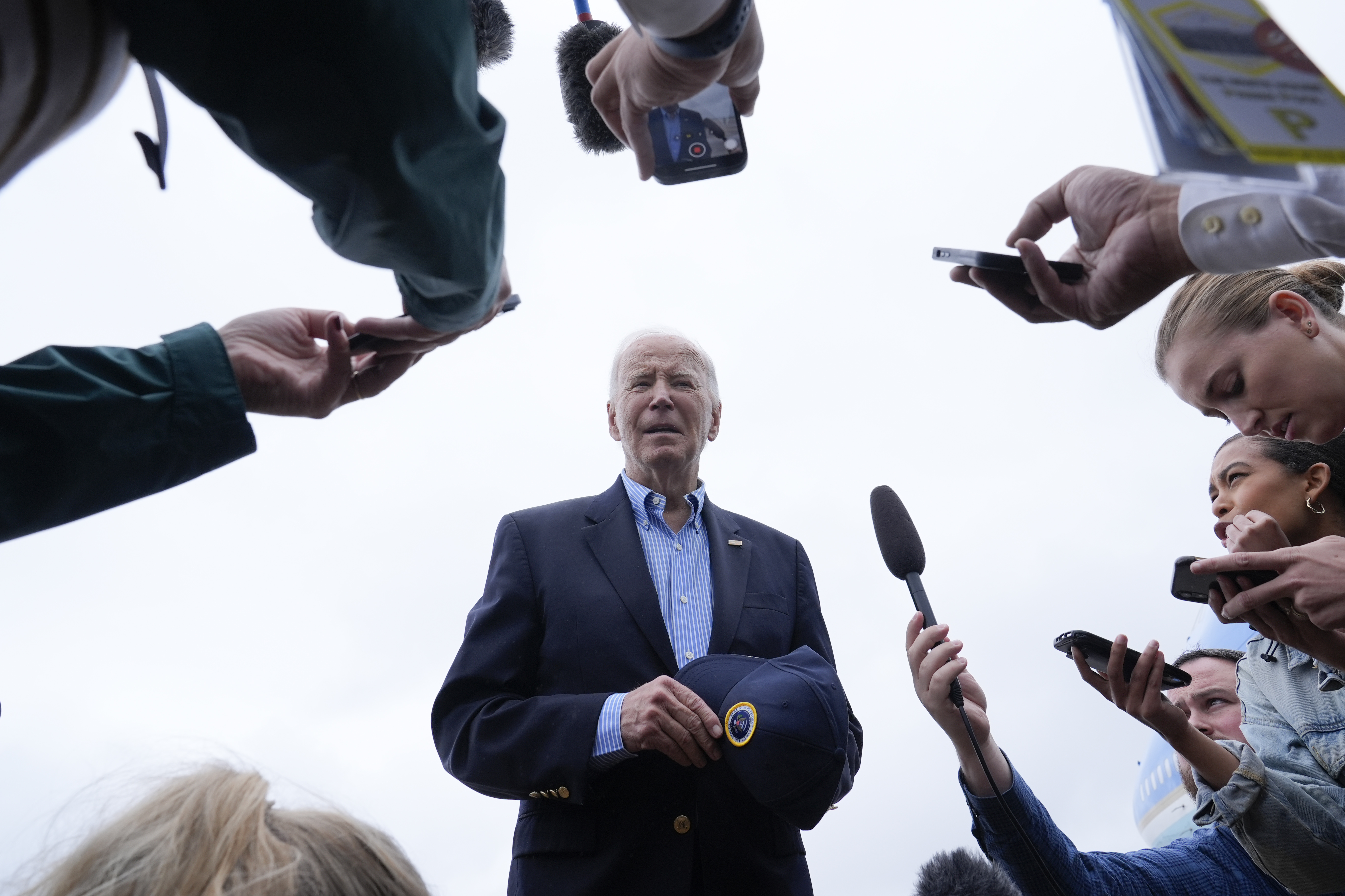 President Joe Biden speaks to the media before boarding Air Force One at Joint Base Andrews, Md., Wednesday, Oct. 2, 2024, as he heads to North and South Carolina to survey damage from Hurricane Helene. (AP Photo/Susan Walsh)