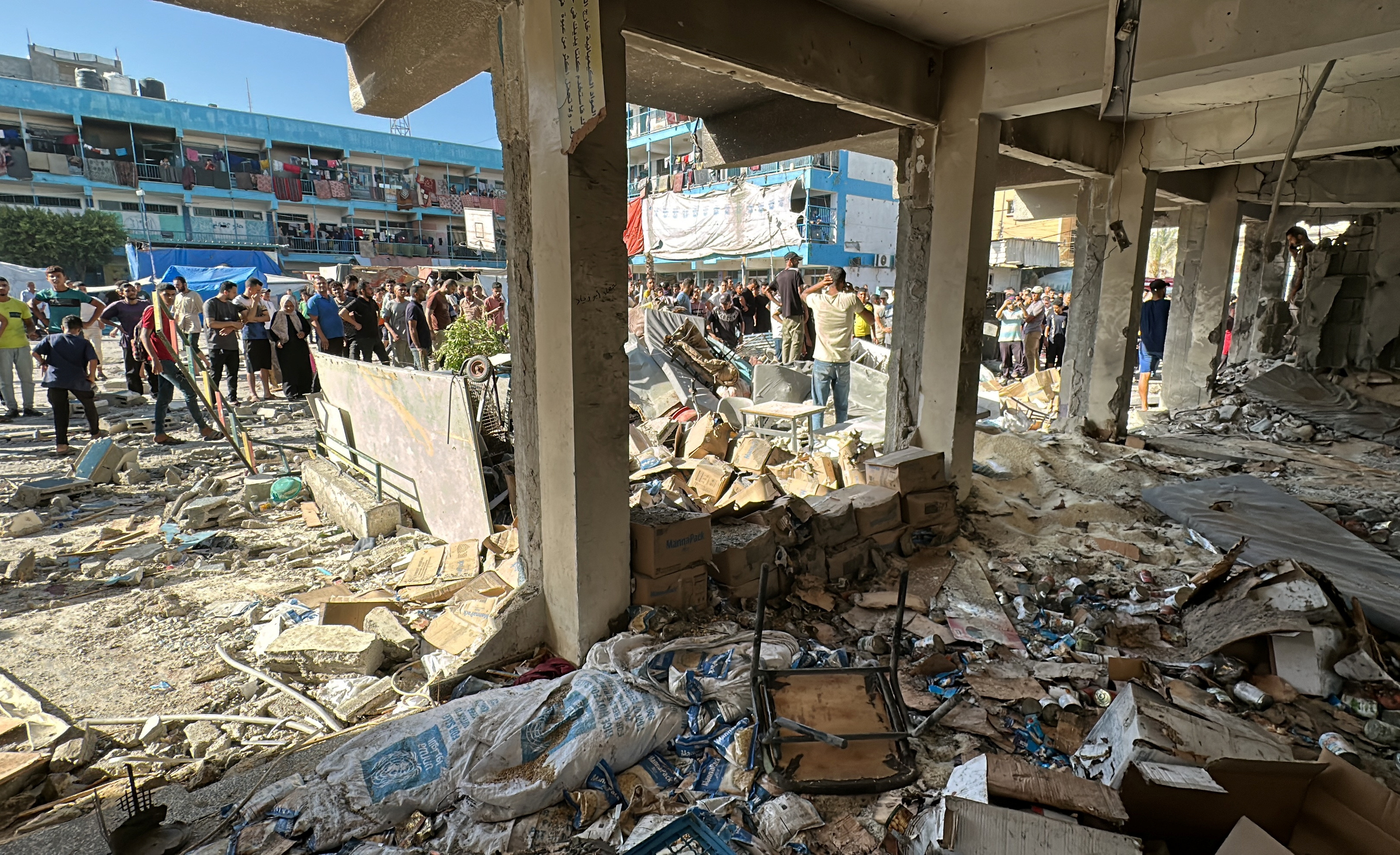 Palestinians inspect a school sheltering displaced people, after it was hit by an Israeli strike, amid the Israel-Hamas conflict, in Nuseirat in the central Gaza Strip, September 11, 2024. REUTERS/Khamis Al-Rifi