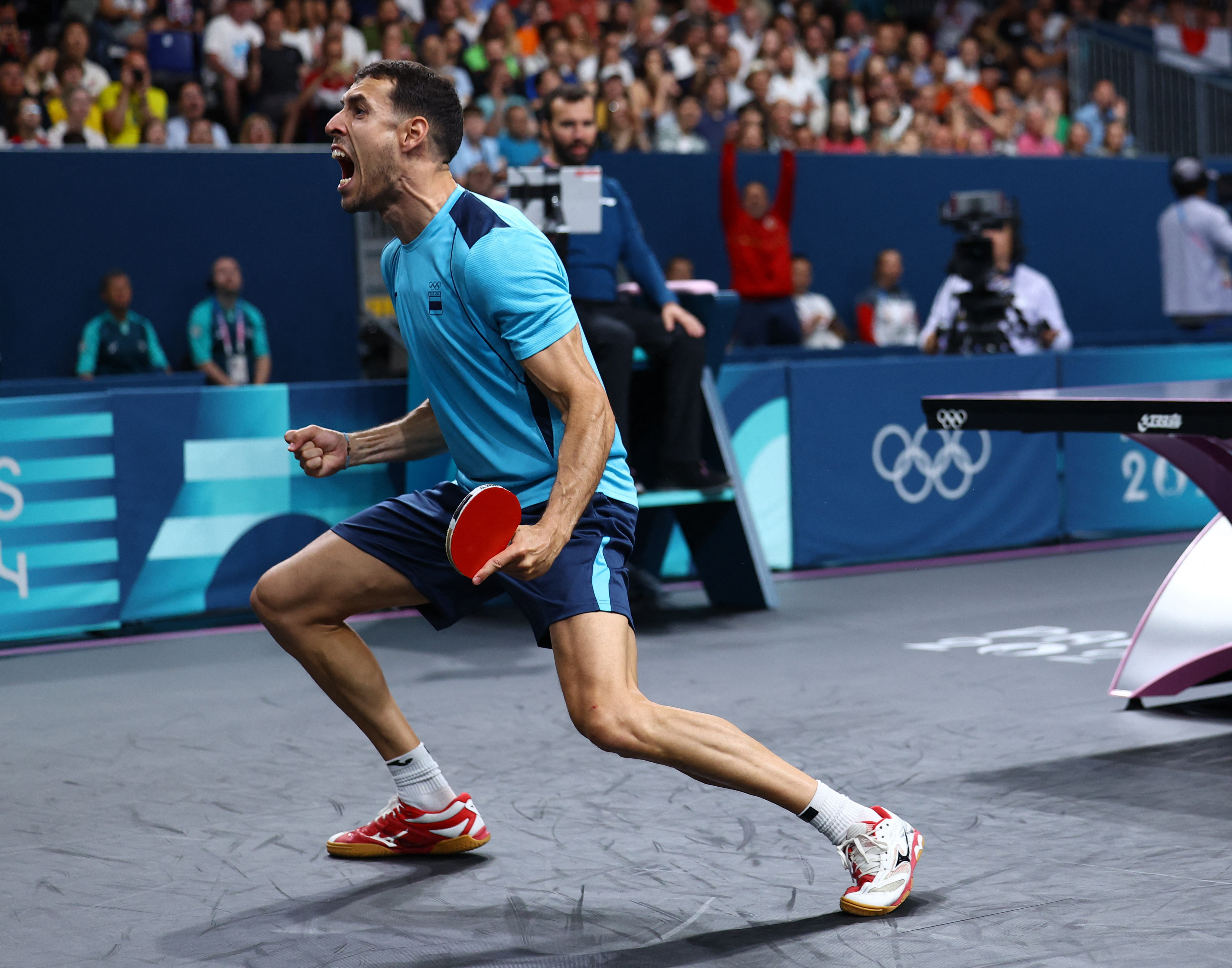 Paris 2024 Olympics - Table Tennis - Men's Singles Round of 64 - South Paris Arena 4, Paris, France - July 29, 2024. Alvaro Robles of Spain celebrates after winning his round of 64 match against Daniel Habesohn of Austria. REUTERS/Stephanie Lecocq