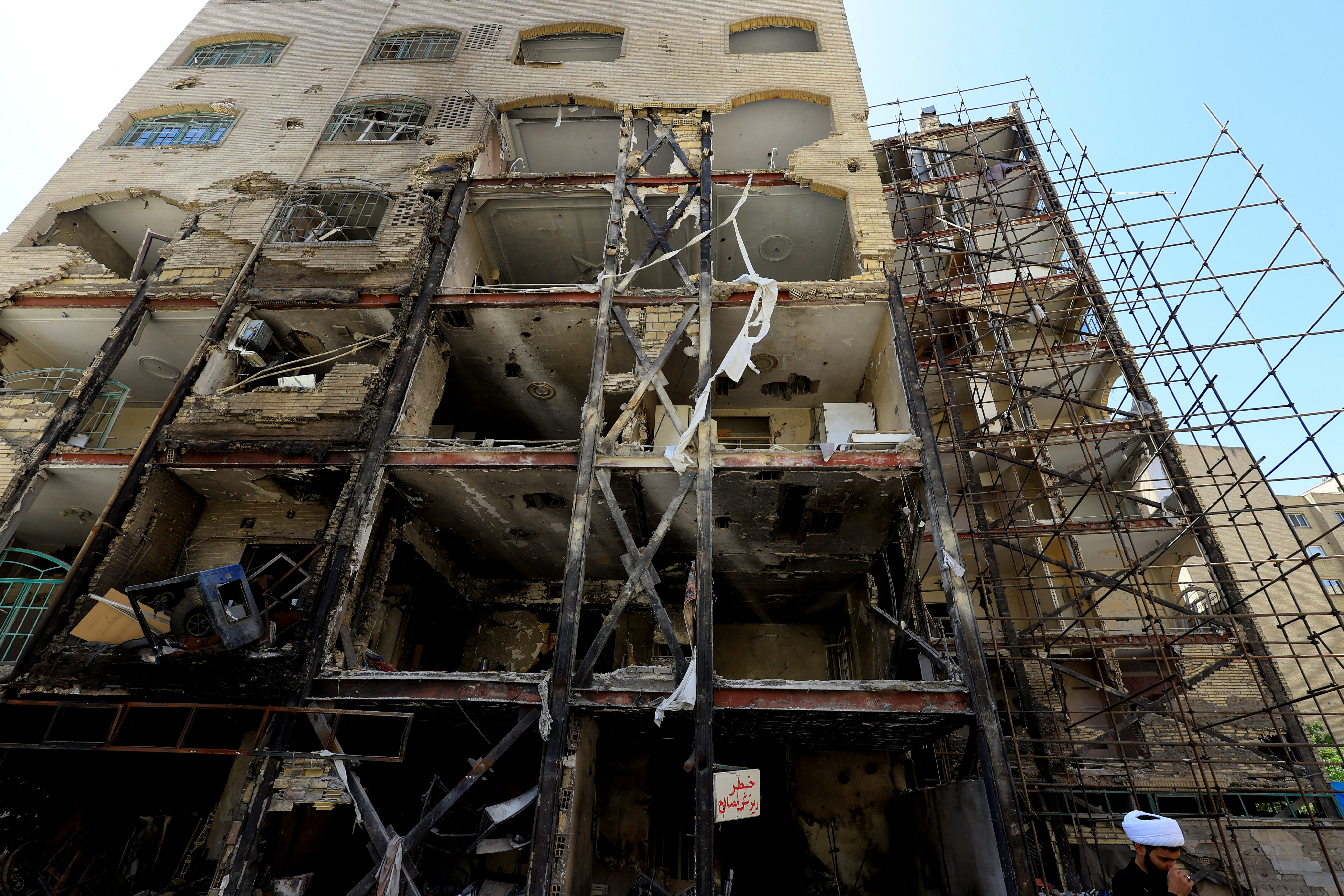 A residential building damaged by a strike on March 4, in Tehran, Iran, April 14, 2026. REUTERS/Thaier Al Sudani