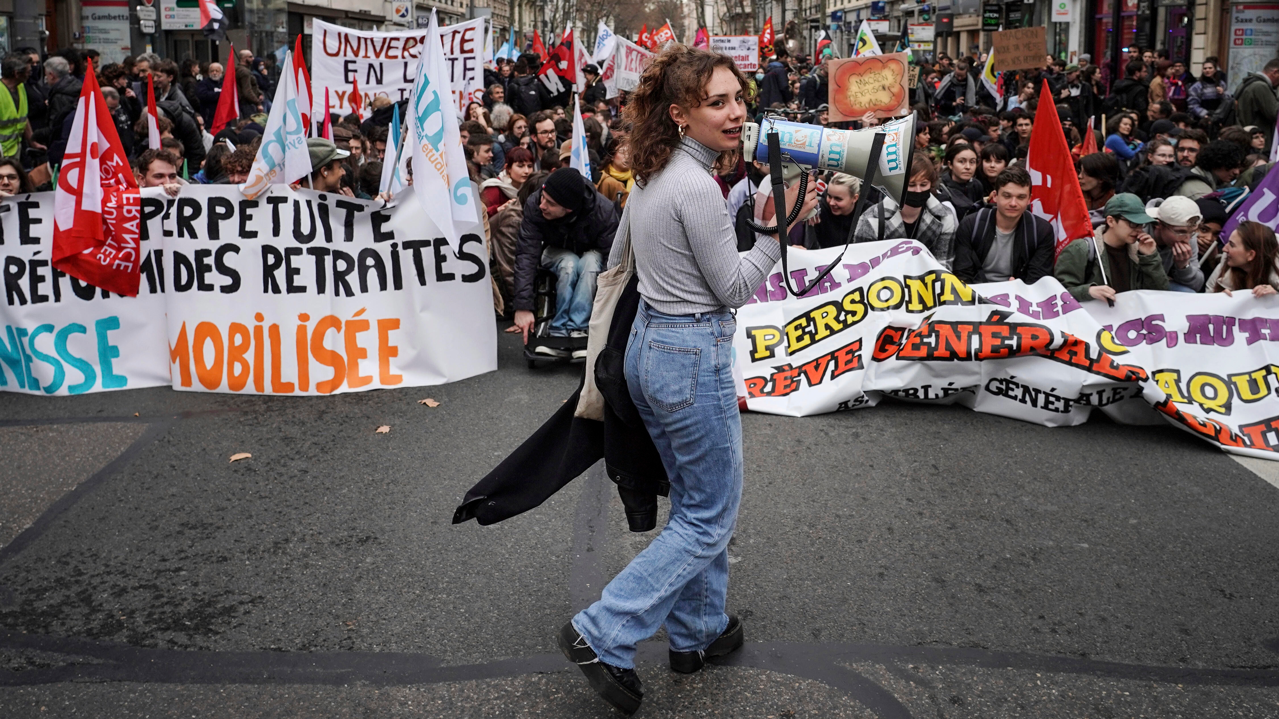 Students shout slogans during a protest in Lyon, central France, Thursday, March 9, 2023. Young people in France — including some who haven't even entered the job market yet — are protesting against the government's push to raise the retirement age. (AP Photo/Laurent Cipriani)