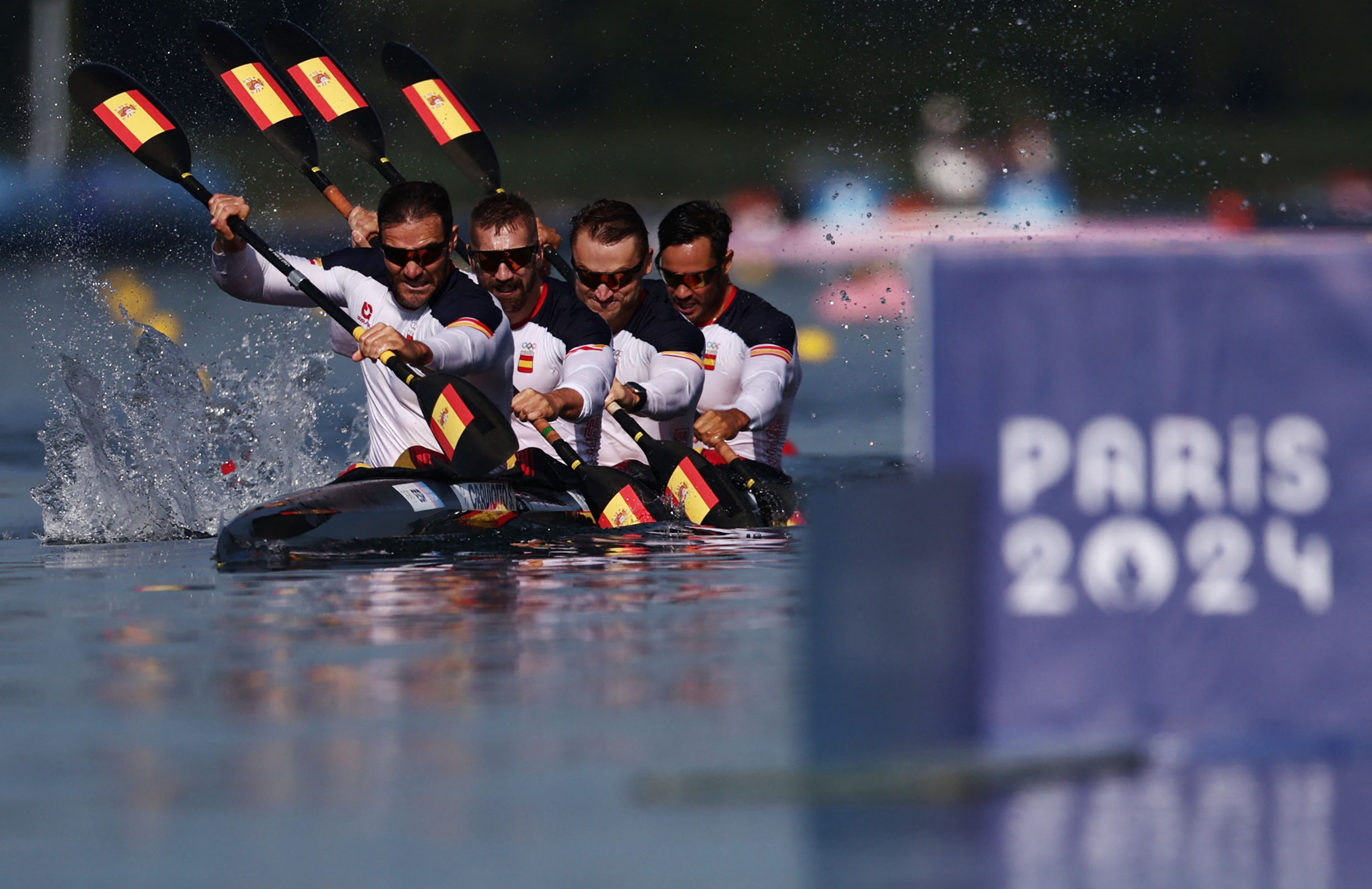 Paris 2024 Olympics - Sprint Canoe - Men's Kayak Four 500m Heats - Vaires-sur-Marne Nautical Stadium - Flatwater, Vaires-sur-Marne, France - August 06, 2024. Saul Craviotto of Spain, Carlos Arevalo of Spain, Marcus Cooper of Spain and Rodrigo Germade of Spain in action. REUTERS/Yara Nardi