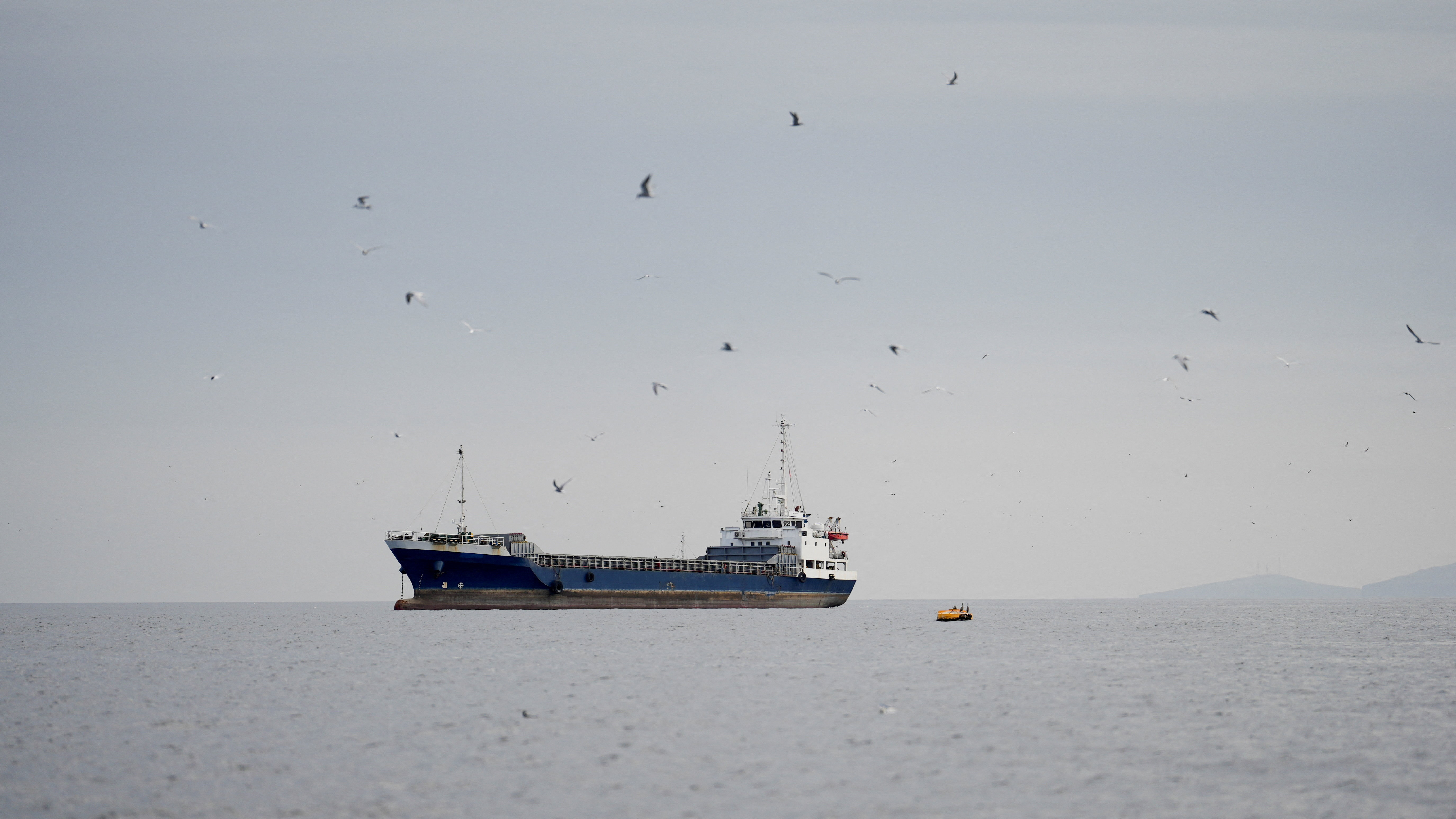 A vessel at the Strait of Hormuz, off the coast of Omans Musandam province, April 12, 2026. REUTERS     TPX IMAGES OF THE DAY     
