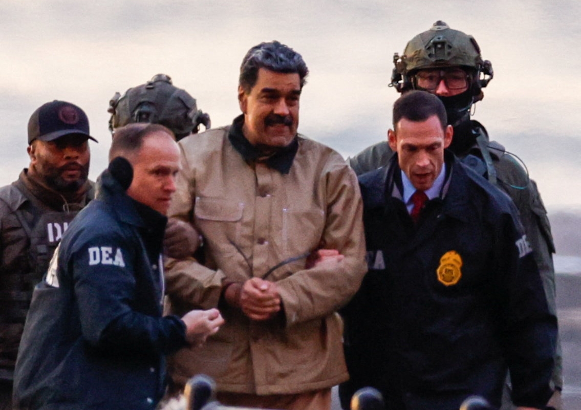 Captured Venezuelan President Nicolas Maduro arrives at the Downtown Manhattan Heliport, as he heads towards the Daniel Patrick Manhattan United States Courthouse for an initial appearance to face U.S. federal charges including narco-terrorism, conspiracy, drug trafficking, money laundering and others in New York City, U.S., January 5, 2026. REUTERS/Eduardo Munoz