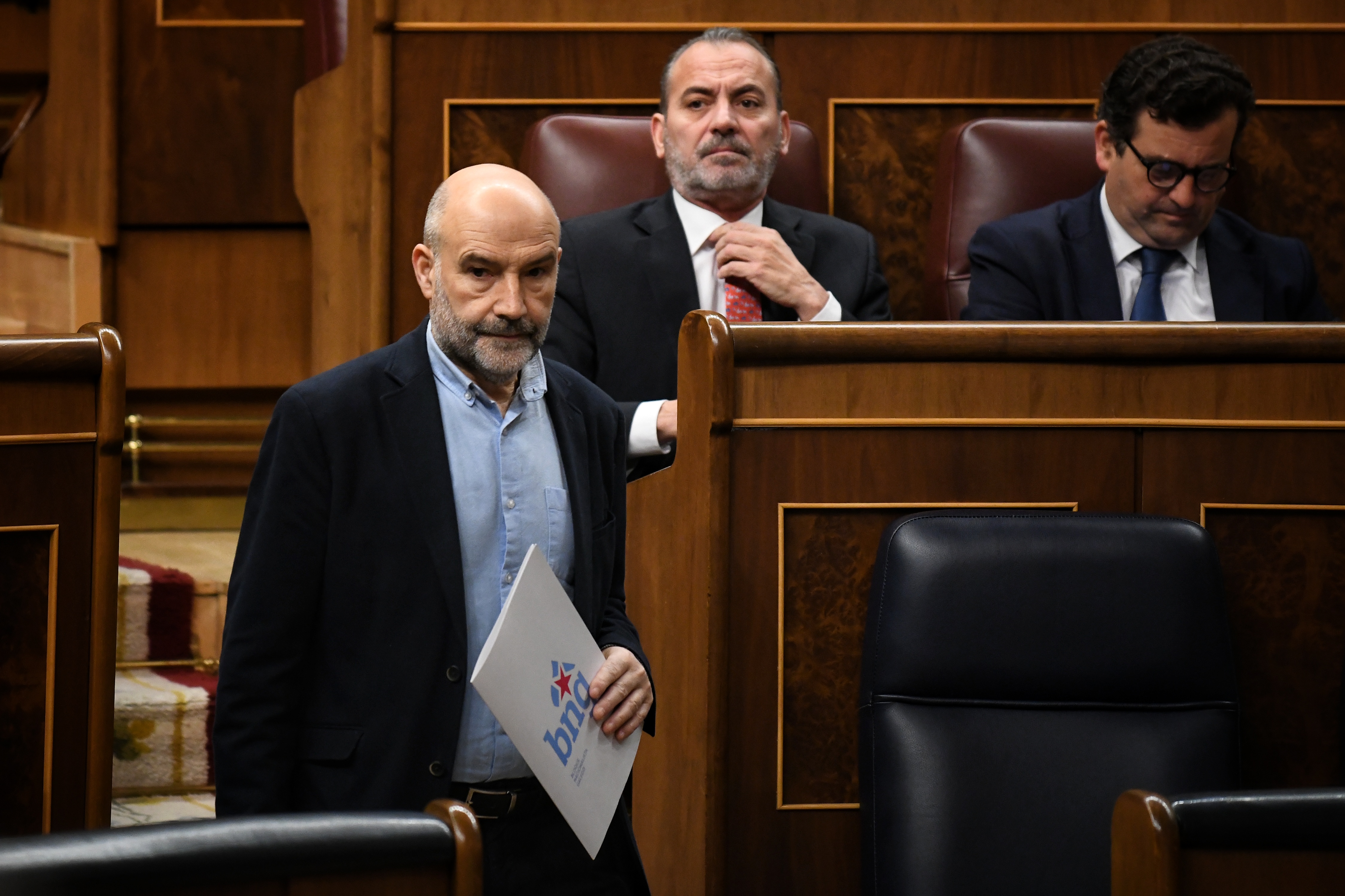 El diputado de BNG, Néstor Rego, durante un pleno en el Congreso de los Diputados, a 19 de diciembre de 2024, en Madrid (España). El Pleno del Congreso da 'luz verde' definitiva al proyecto de ley por el que se crea un nuevo impuesto mínimo para las empresas multinacionales, una norma que incluye parte de la reforma fiscal que quería el Gobierno. La duda es si se incluirán las enmiendas de PP y Junts que se han introducido en el Senado y que pueden llegar al Boletín Oficial del Estado (BOE) en contra del criterio del Gobierno. Por otro lado, durante la sesión plenaria, también se vota el proyecto de ley orgánica de prevención de las pérdidas y el desperdicio alimentario.
19 DICIEMBRE 2024;BOE;JUNTS;PP;LUZ VERDE;MEDIDAS;CONGRESO
Fernando Sánchez / Europa Press
19/12/2024