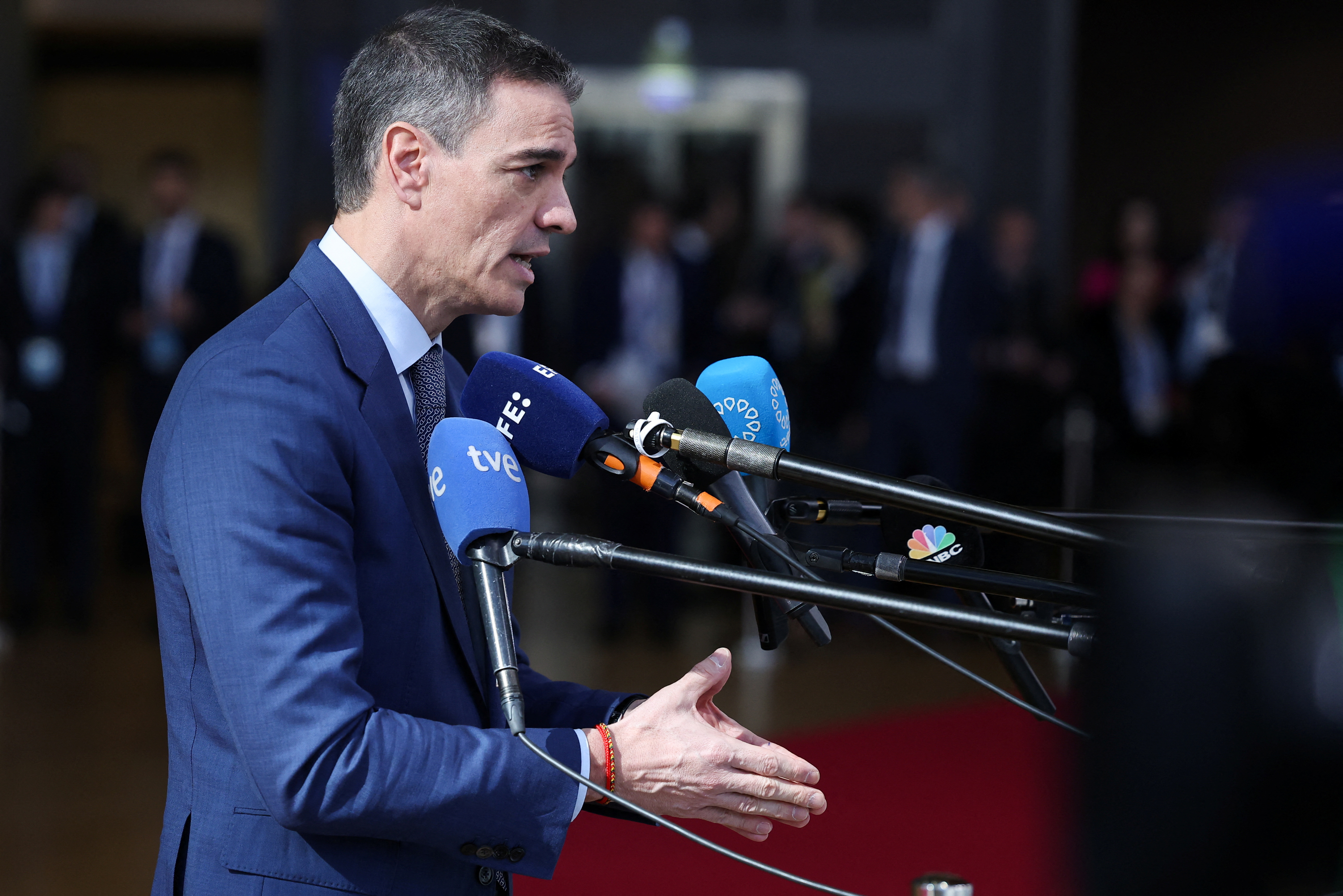 Spanish Prime Minister Pedro Sanchez speaks to the media as he attends a European Union summit in Brussels, Belgium March 20, 2025. REUTERS/Yves Herman