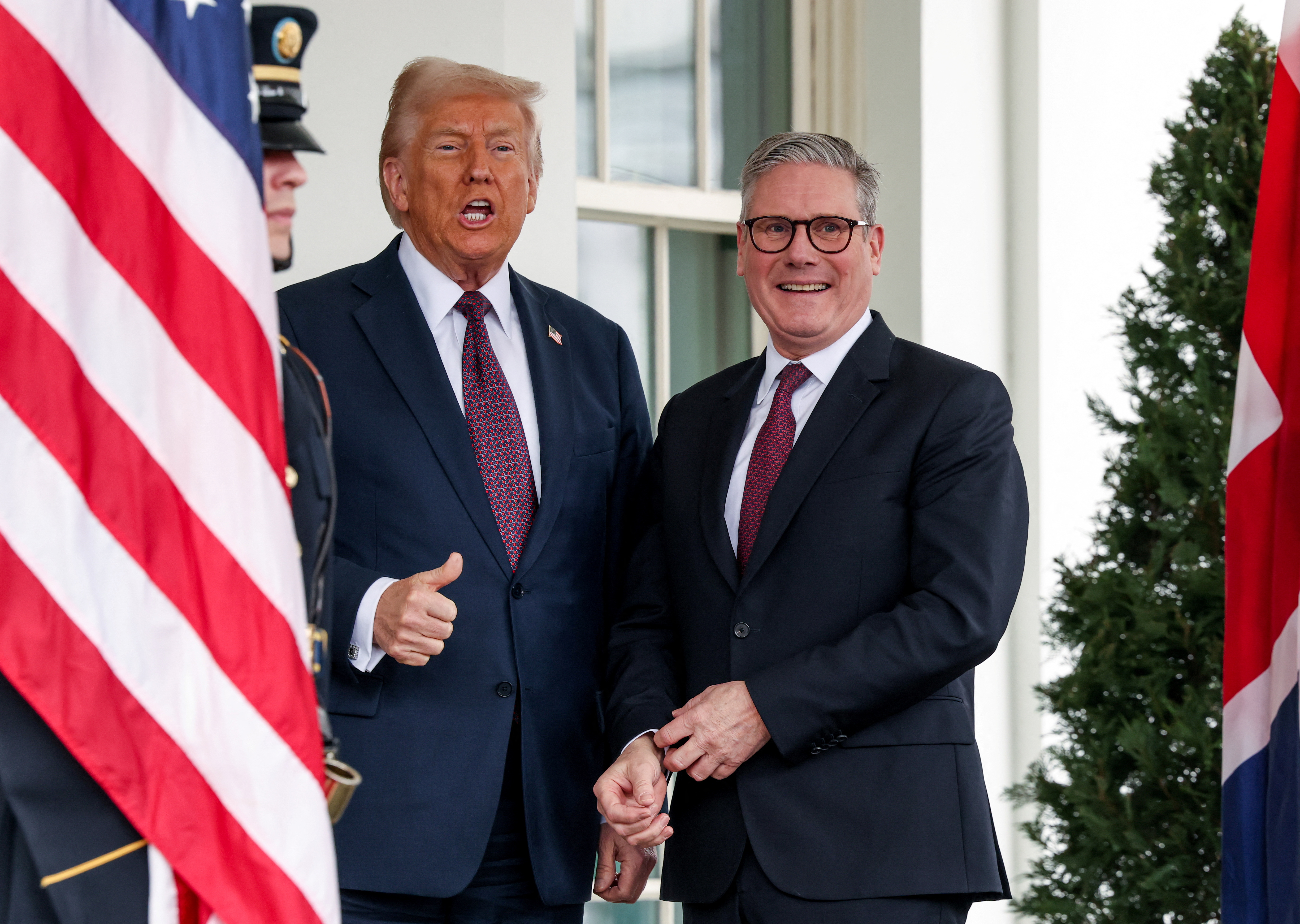 U.S. President Donald Trump gestures as he meets with British Prime Minister Keir Starmer at the White House in Washington, D.C., U.S., February 27, 2025. REUTERS/Kevin Lamarque