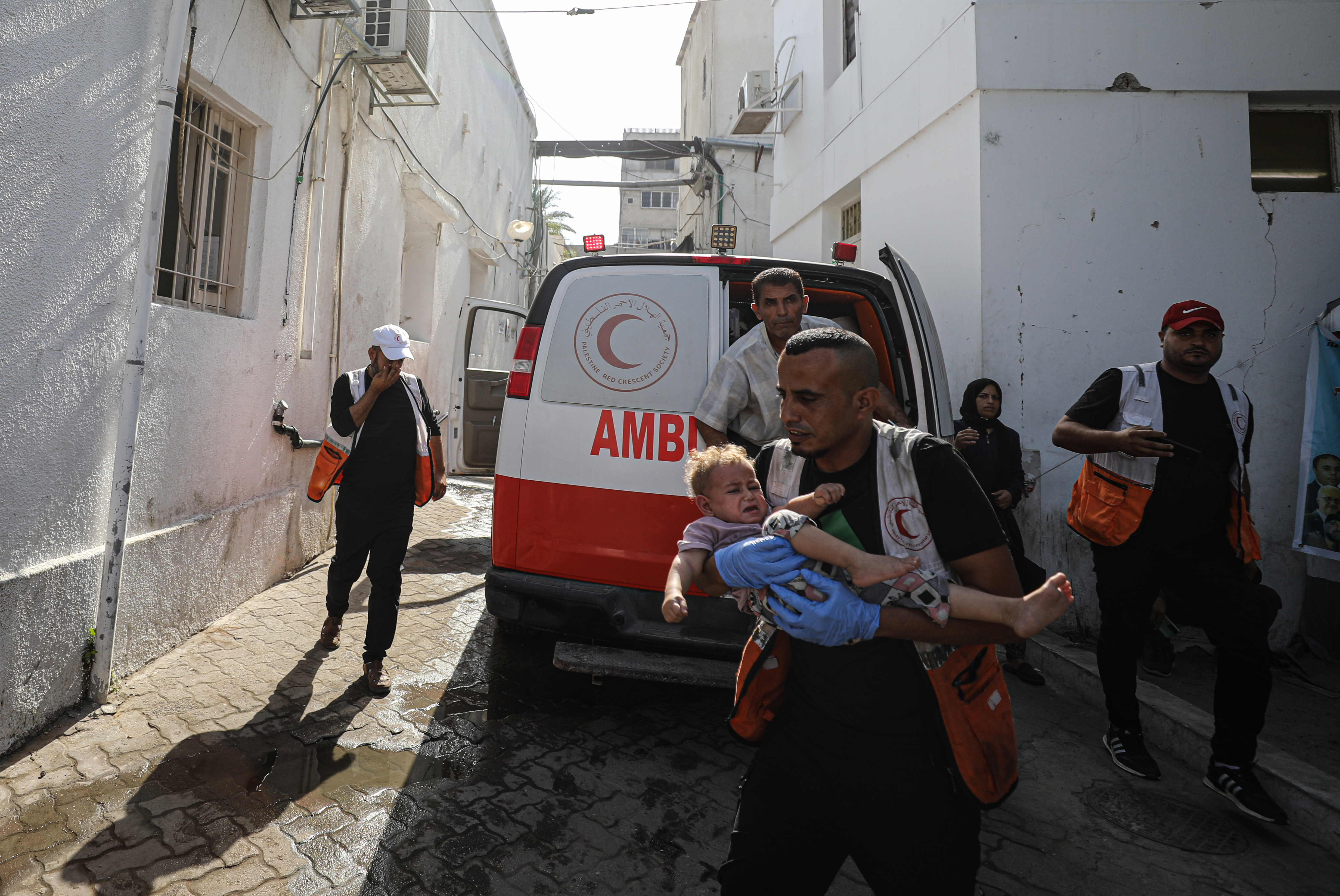 GAZA CITY, GAZA - OCTOBER 14: Injured Palestinians, including children, are brought to Al Ahli Baptist Hospital after an Israeli attack on the Jibalia refugee camp in Gaza City, Gaza on October 14, 2024.  It was reported that there were dead and wounded as a result of the attack. (Photo by Dawoud Abo Alkas/Anadolu via Getty Images)