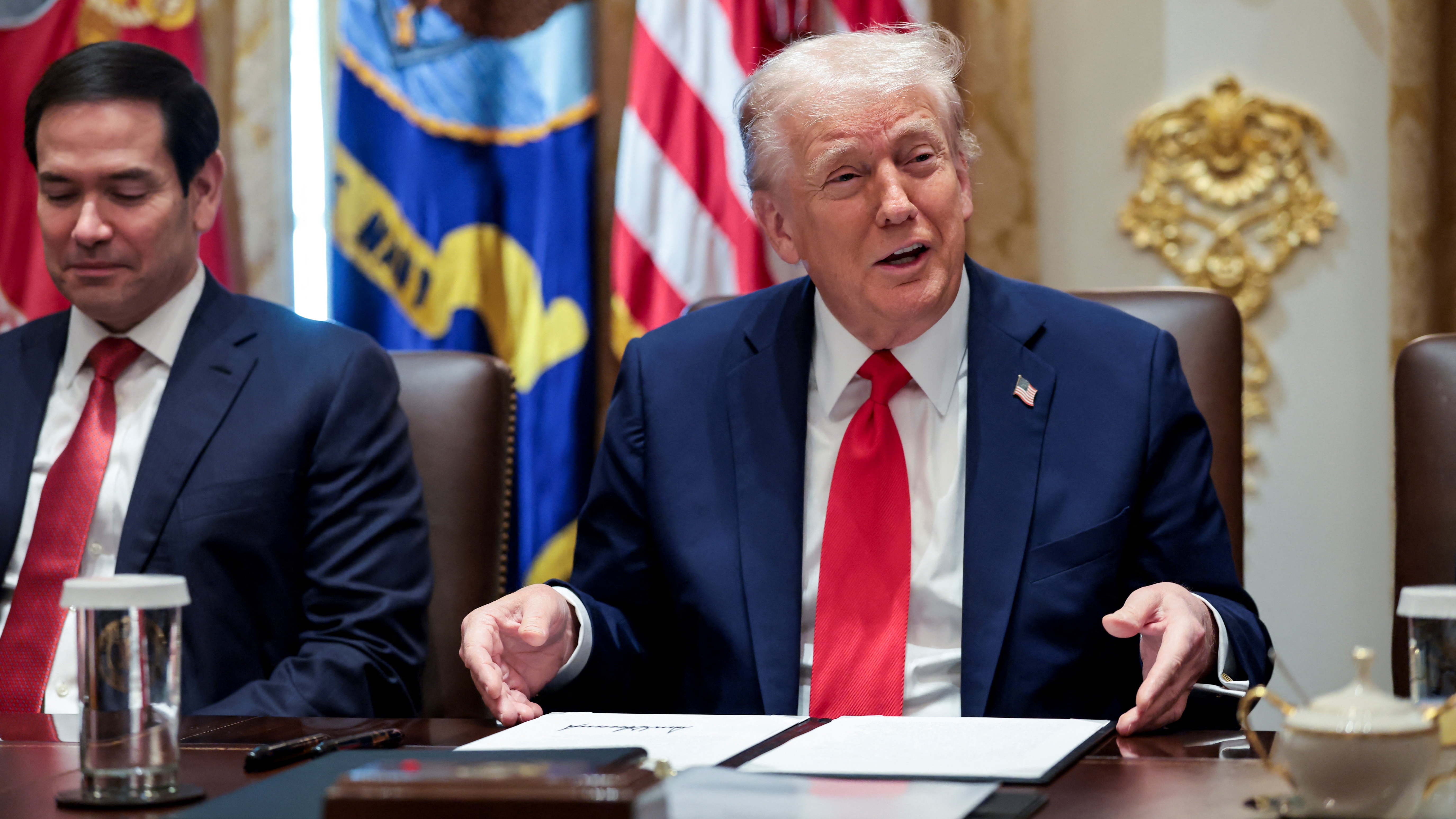 U.S. President Donald Trump and U.S. Secretary of State Marco Rubio attend a cabinet meeting at the White House in Washington, D.C., U.S., October 9, 2025. REUTERS/Evelyn Hockstein 
