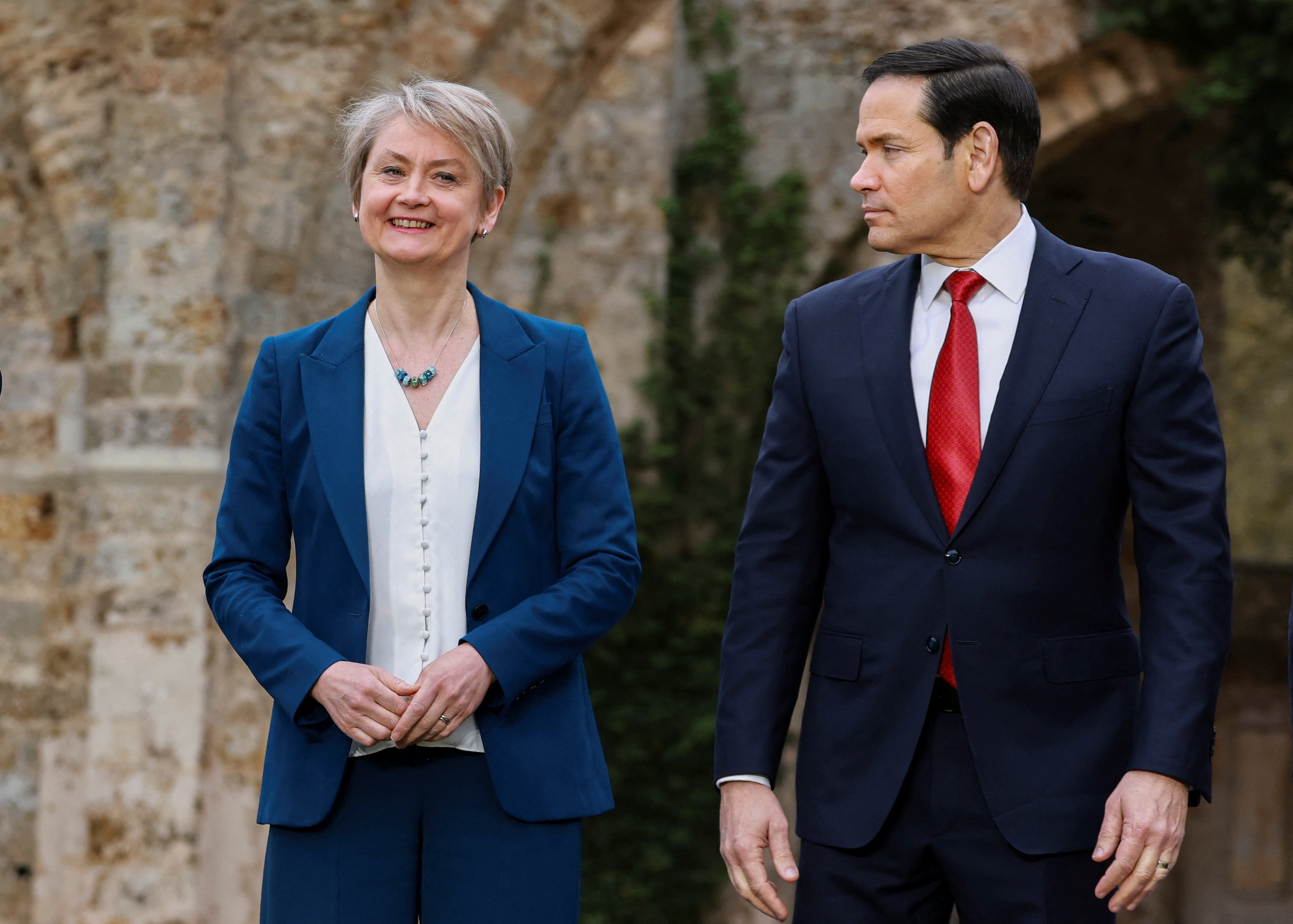 U.S. Secretary of State Marco Rubio and Britain's Foreign Secretary Yvette Cooper attend a family photo session on the second day of the G7 Foreign Ministers' Meeting in Vaux-de-Cernay Abbey in Cernay-la-Ville near Paris, France, March 27, 2026. REUTERS/Stephanie Lecocq REFILE - QUALITY REPEAT