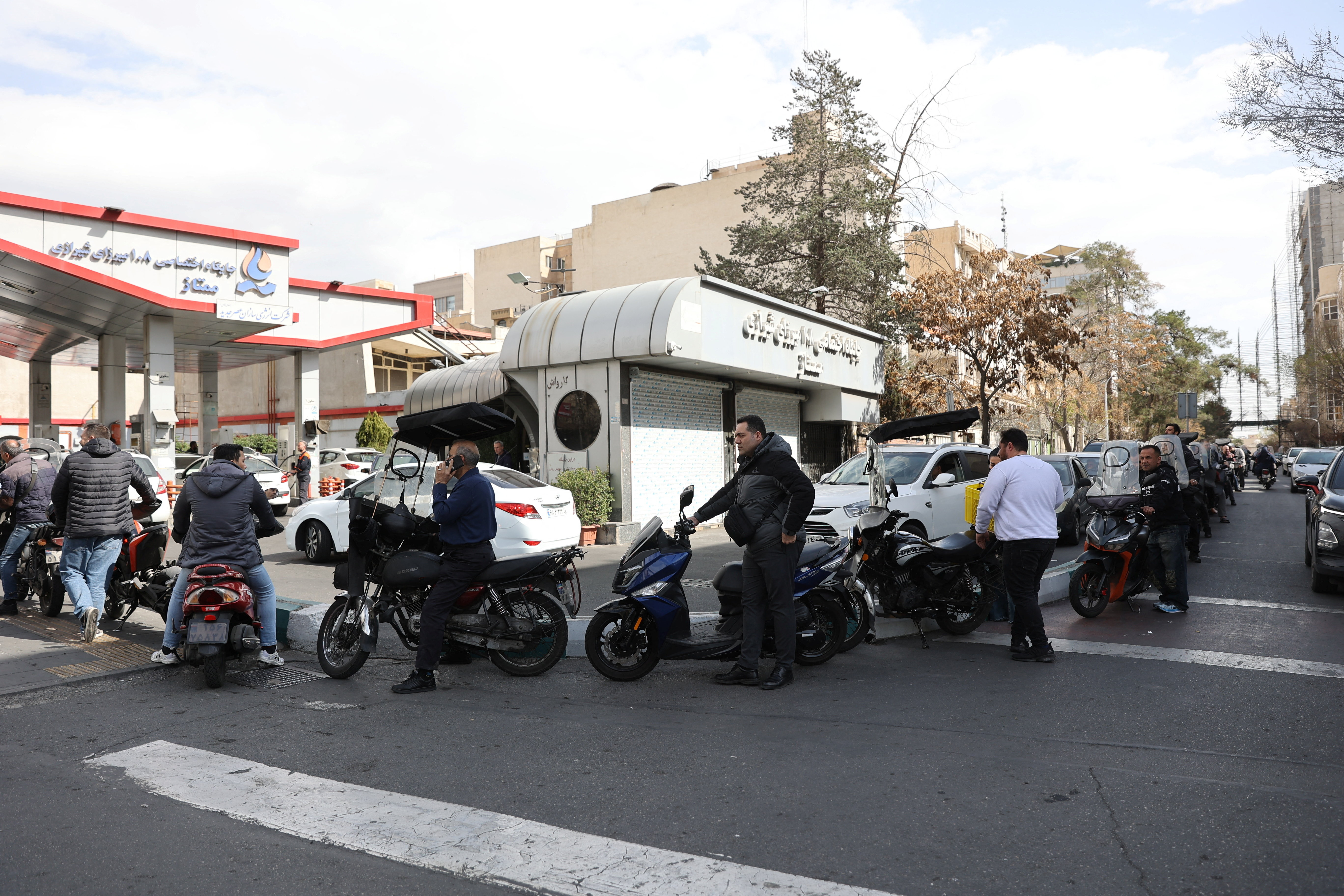 People wait for their turn at a fuel station, after Israel and the U.S. launched strikes on Iran, in Tehran, Iran, February 28, 2026. Majid Asgaripour/WANA (West Asia News Agency) via REUTERS ATTENTION EDITORS - THIS PICTURE WAS PROVIDED BY A THIRD PARTY