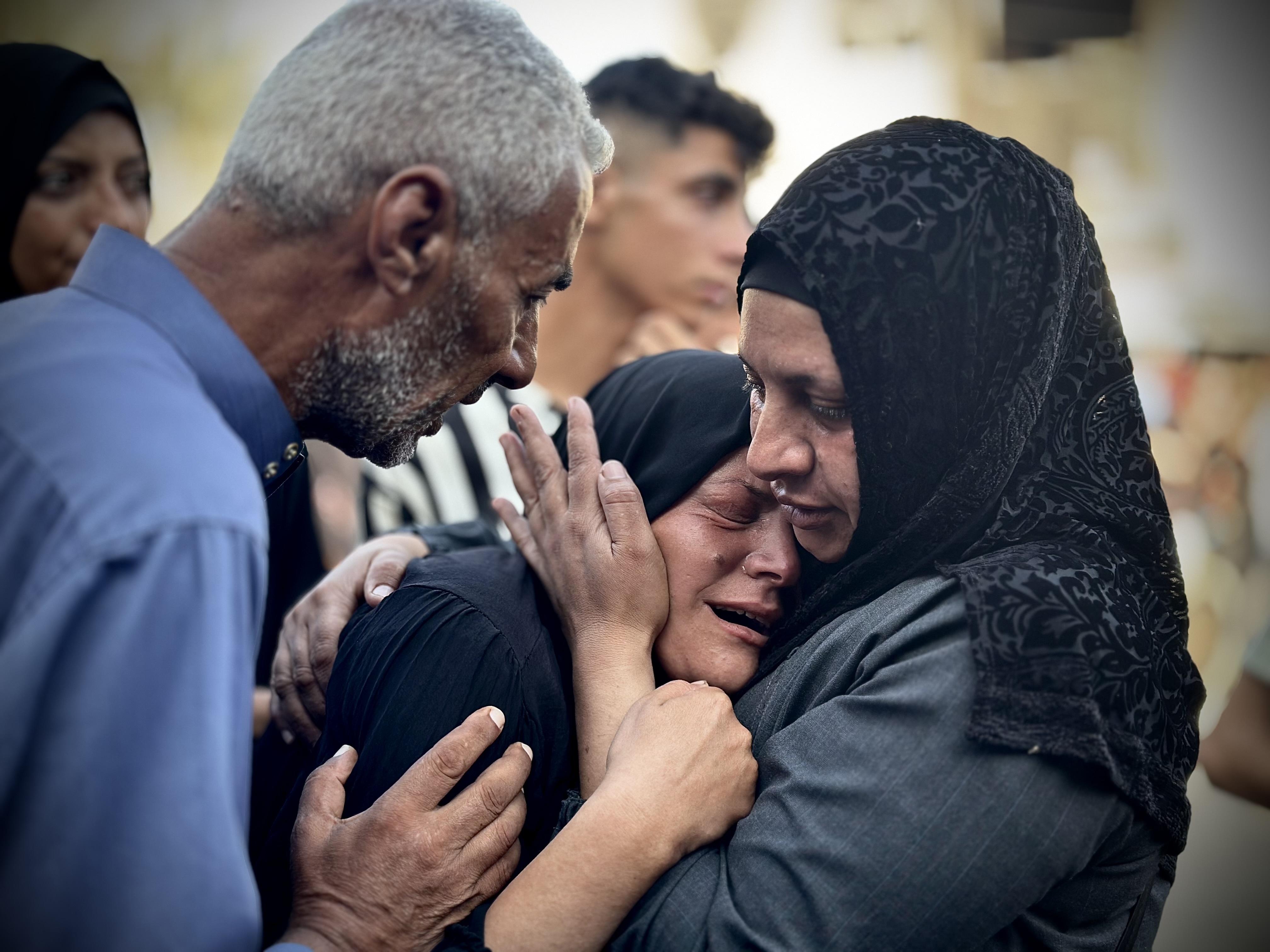 KHAN YUNIS, GAZA - SEPTEMBER 10: Palestinians mourn their loved ones killed by Israeli airstrikes that hit tent camp in Khan Yunis, Gaza on September 10, 2024. Families take bodies from Nasser Hospital ahead of funeral and burial. At least 40 Palestinians were killed and more than 60 injured early Tuesday in Israeli airstrikes on a tent encampment in Khan Yunis. (Photo by Doaa Albaz/Anadolu via Getty Images)