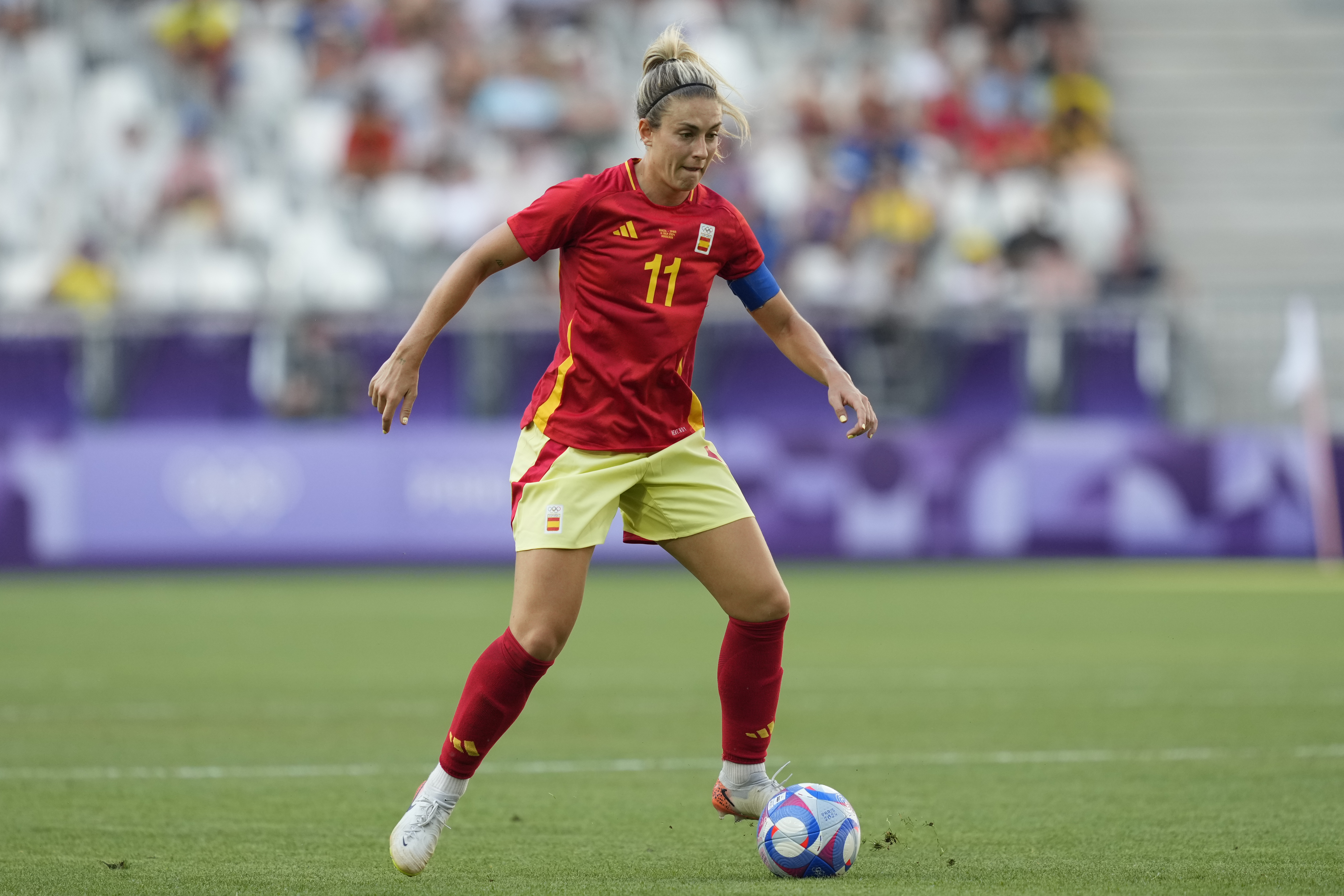 Spain's Alexia Putellas controls the ball during a women's Group C soccer match between Brazil and Spain, at Bordeaux Stadium, during the 2024 Summer Olympics, Wednesday, July 31, 2024, in Bordeaux, France. (AP Photo/Moises Castillo)