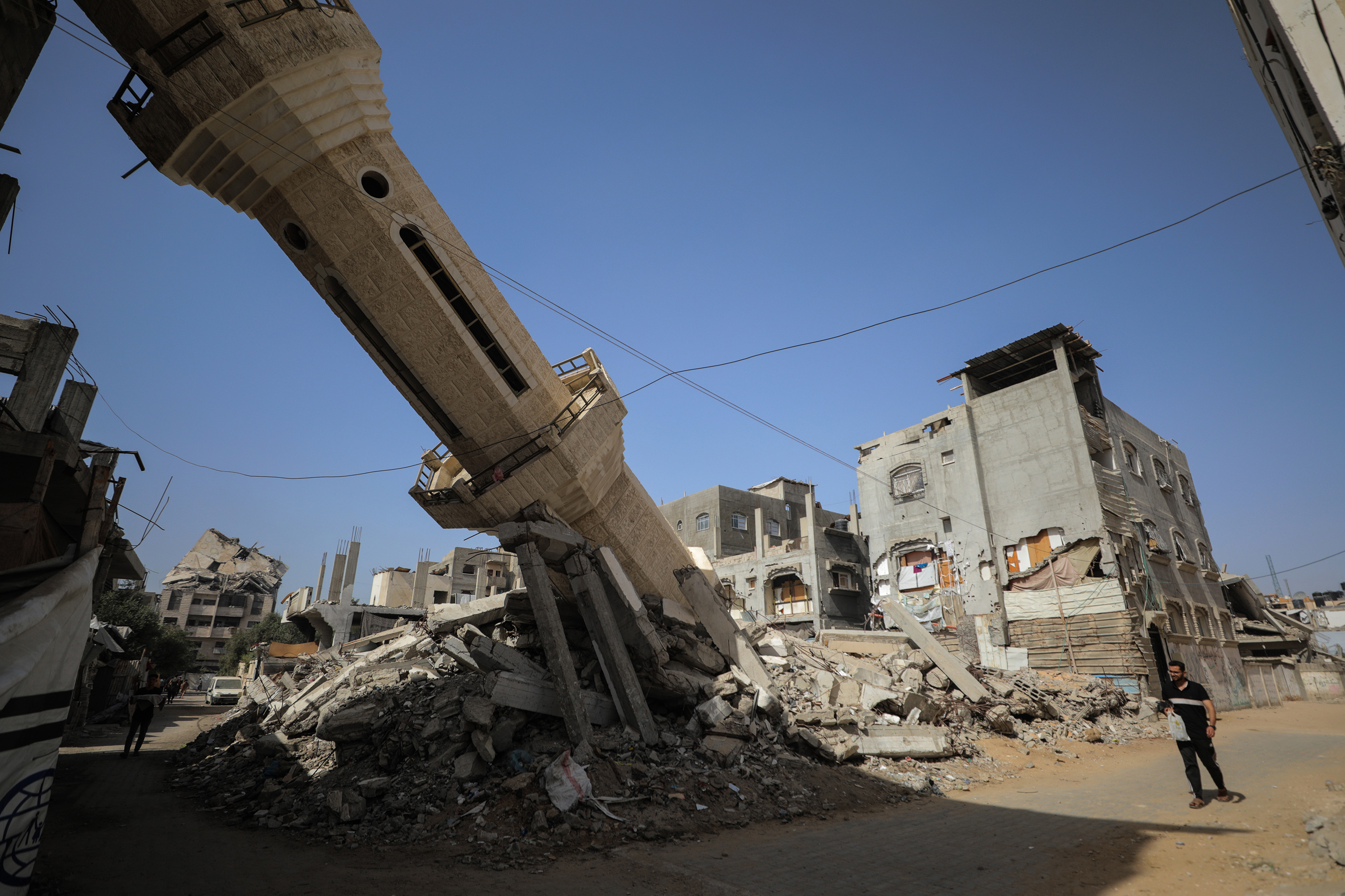 GAZA CITY, GAZA - OCTOBER 04: A view of the partially collapsed mosque after Israeli attacks on Gaza City, Gaza on October 04, 2025. Since Israel's attacks on October 7, United Nations facilities, schools, hospitals, mosques, churches, and numerous historical buildings have been damaged. Dozens of mosques across the Gaza Strip have suffered severe destruction, while in the central Nuseirat area, places of worship and surrounding structures have been reduced to rubble and ashes (Photo by Hassan Jedi/Anadolu via Getty Images)