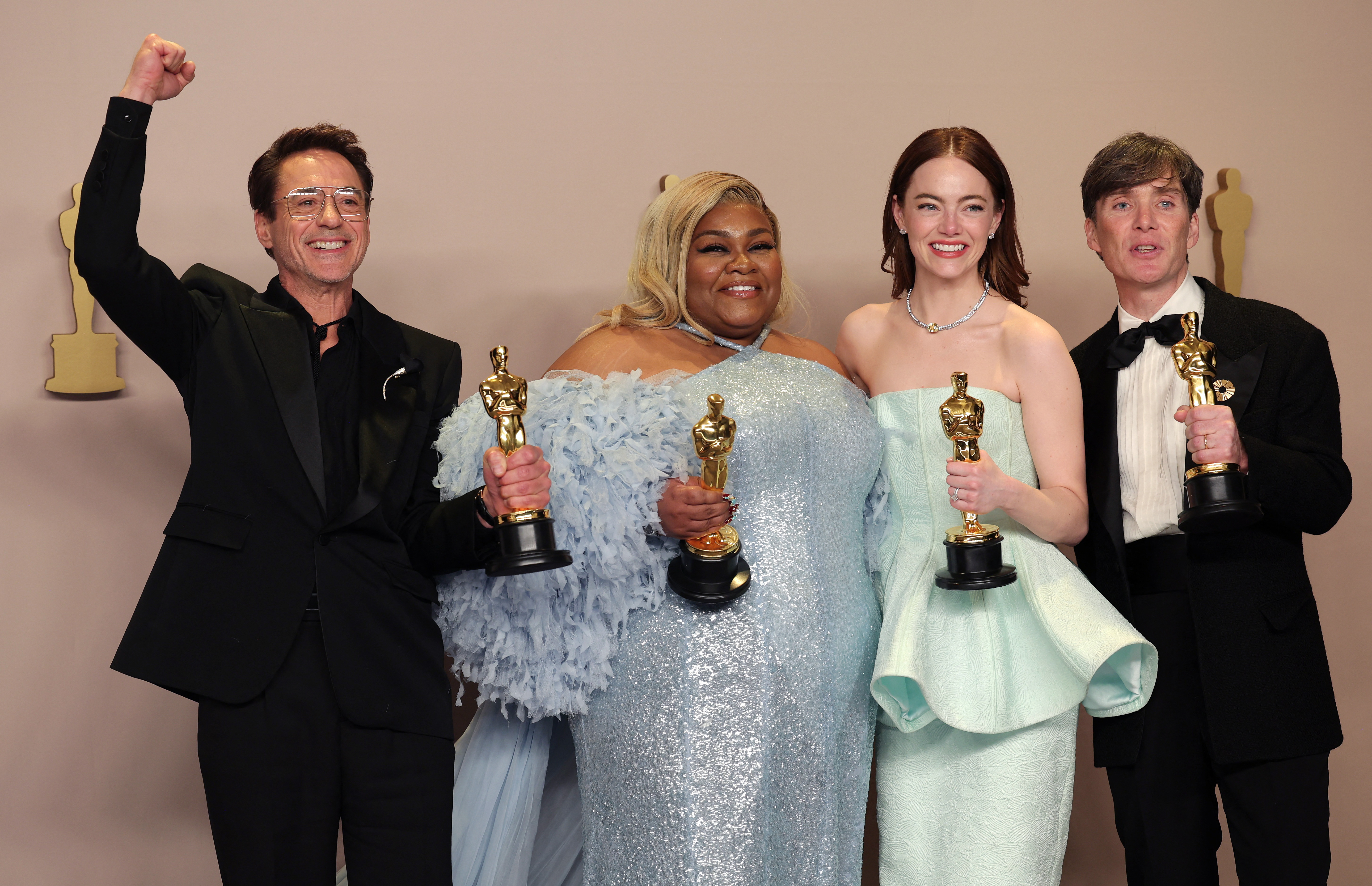 "Oppenheimer", joins Emma Stone, winner of the Best Actress Oscar for "Poor Things", Da'Vine Joy Randolph, Best Supporting Actress Oscar winner for "The Holdovers", and Robert Downey Jr., Best Supporting Actor Oscar winner for "Oppenheimer", in the Oscars photo room at the 96th Academy Awards in Hollywood, Los Angeles, California, U.S., March 10, 2024. REUTERS/Carlos Barria