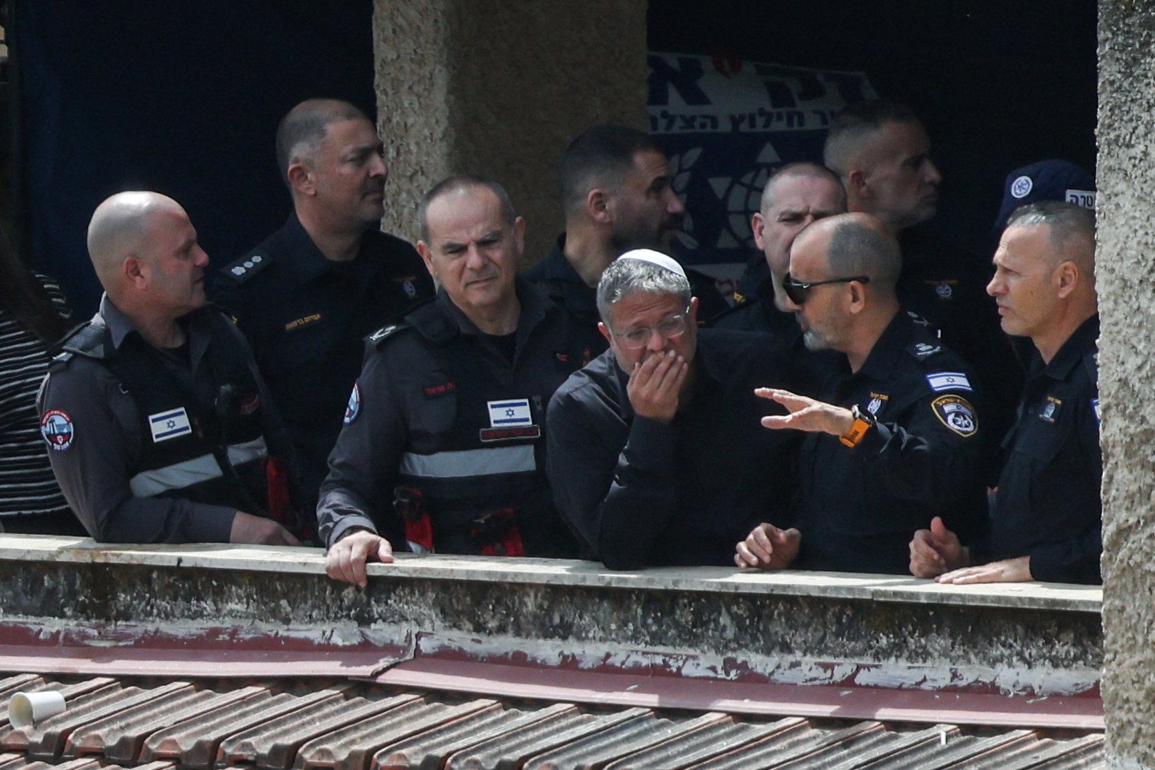 Israeli National Security Minister Itamar Ben-Gvir visits the site of a projectile impact, as the U.S.-Israeli conflict with Iran continues, in Haifa, Israel, April 6, 2026. REUTERS/Shir Torem