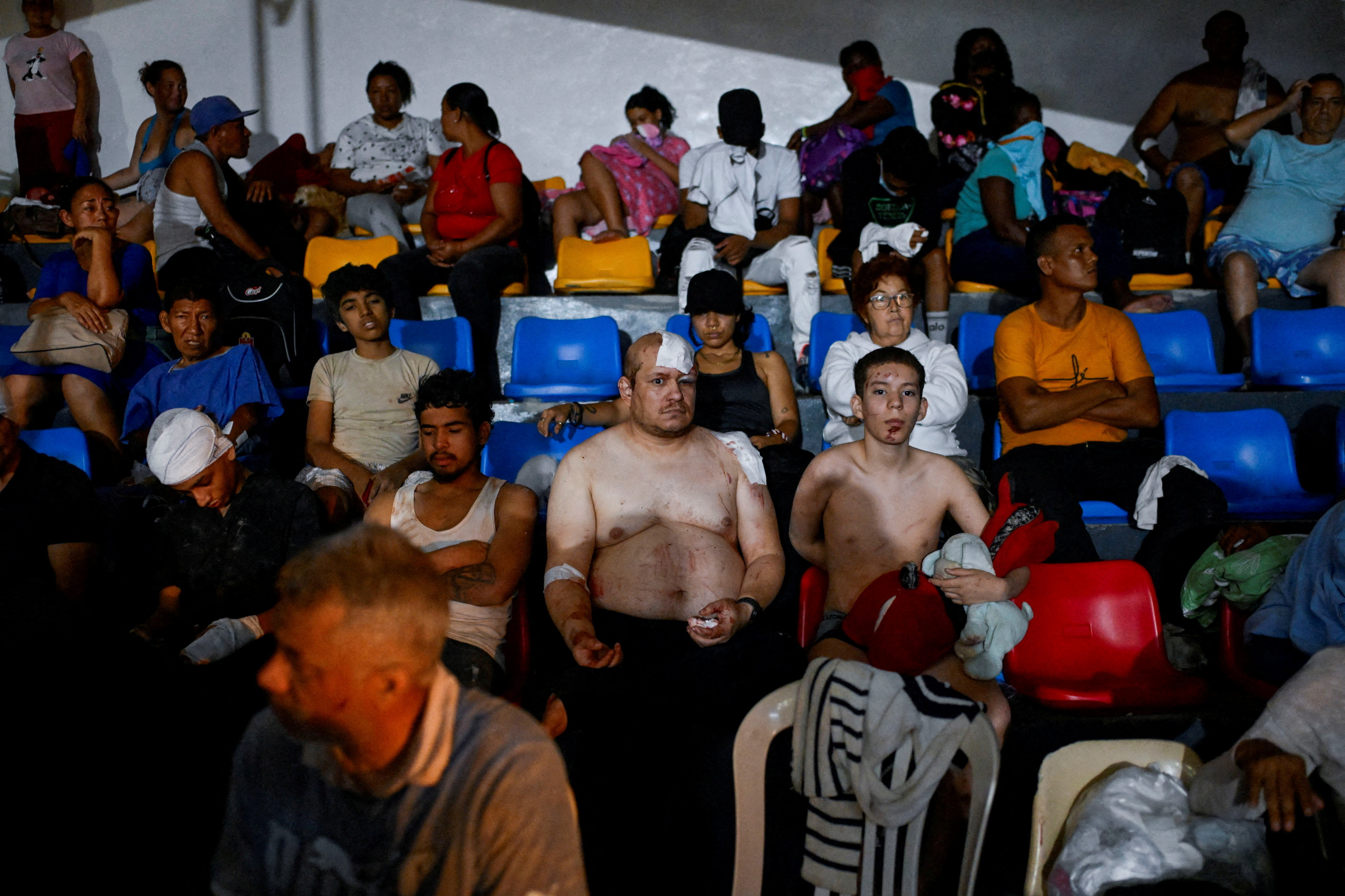 People rest as they receive treatment in a field hospital in the aftermath of earthquakes, in La Guaira, Venezuela, June 24, 2026. REUTERS/Maxwell Briceno TPX IMAGES OF THE DAY 