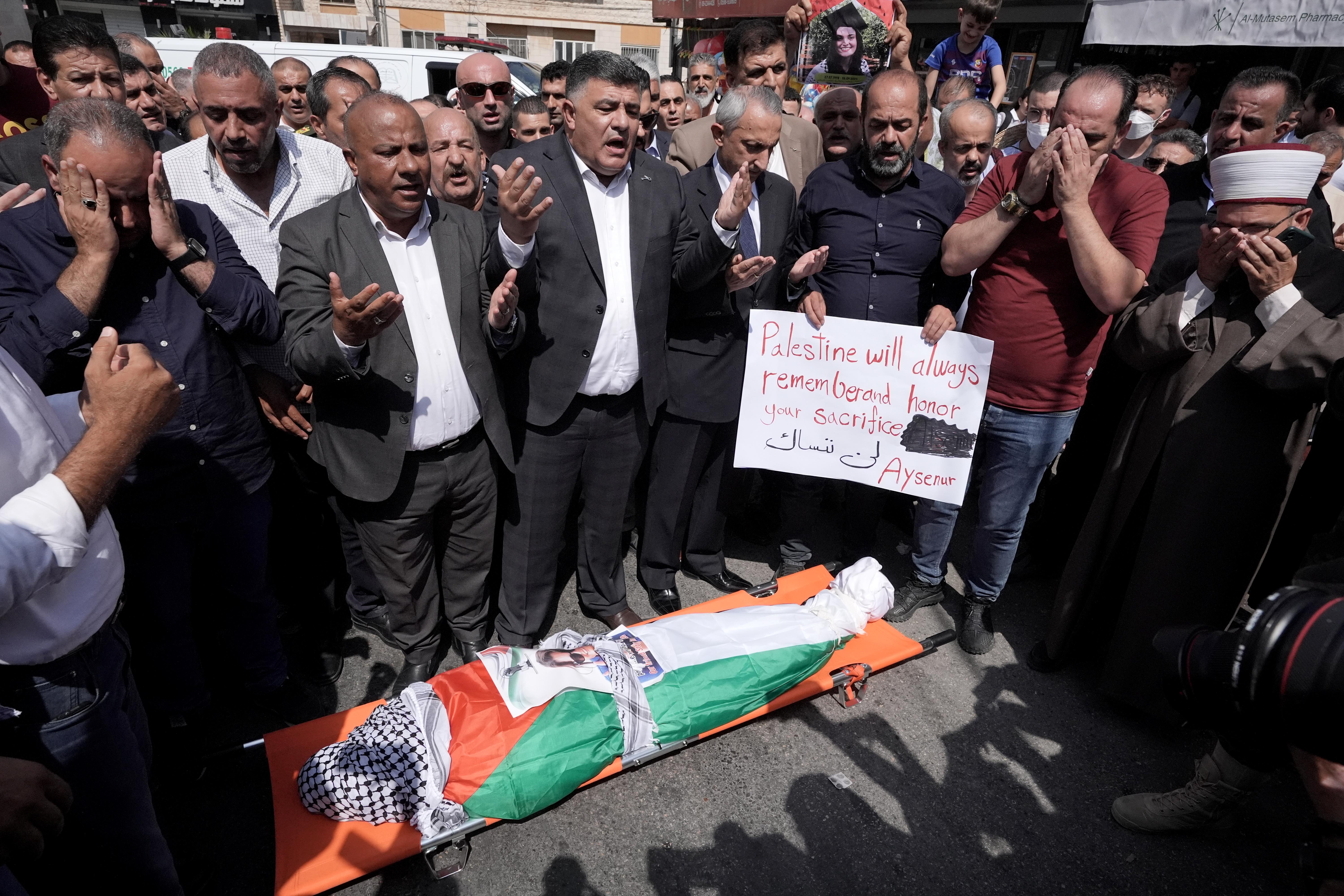 NABLUS, WEST BANK - SEPTEMBER 09: Turkiye's Consul General in Jerusalem, Ambassador Ismail Cobanoglu, Nablus Governor Ghassan Daghlas attend funeral procession of Turkish-American activist Aysenur Ezgi Eygi, who was killed by Israeli forces on Friday, with participation of officials in the West Bank city of Nablus on September 09, 2024. Eygi's body was taken from Rafidiyeh Hospital in Nablus with international solidarity activists, Palestinians and various civil society representatives. (Photo by Issam Rimawi/Anadolu via Getty Images)