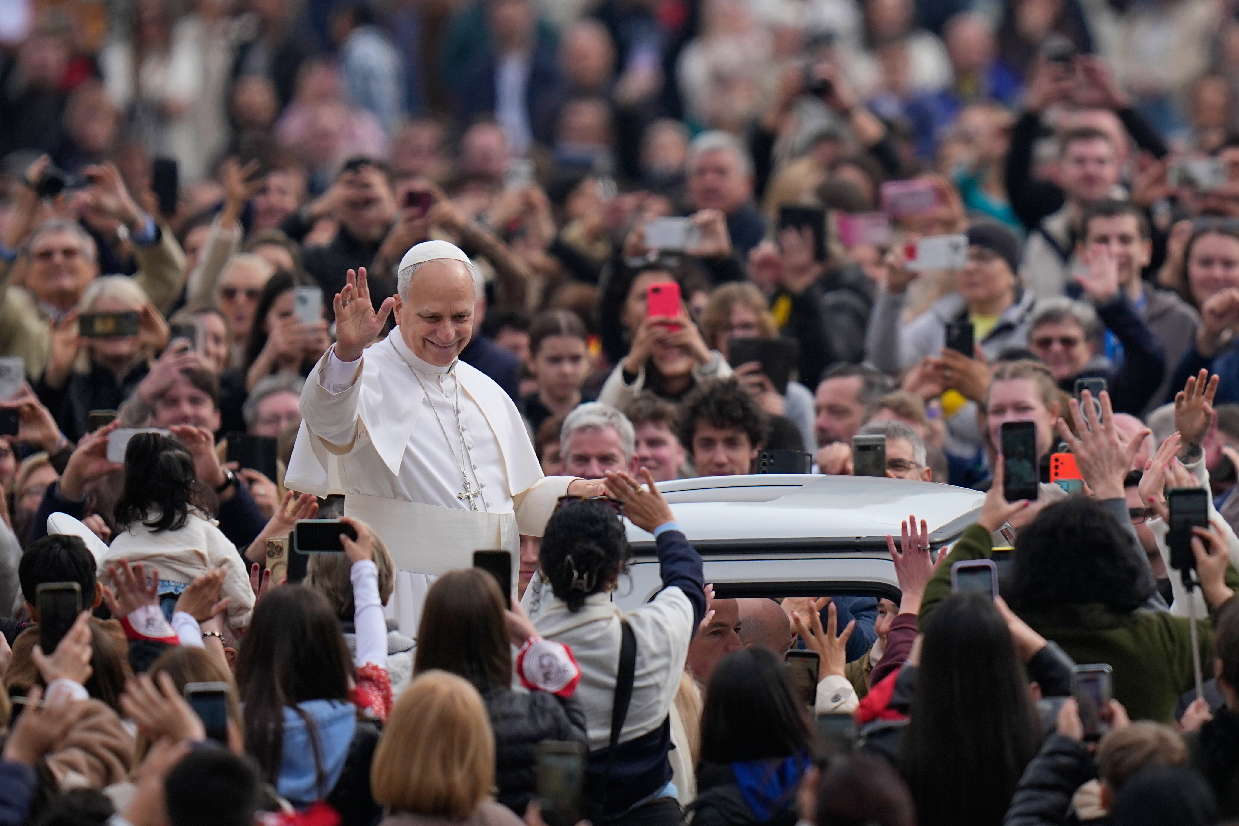 Pope Leo XIV arrives to hold his weekly general audience in St. Peter's Square, at the Vatican, Wednesday, March 4, 2026. (AP Photo/Alessandra Tarantino)