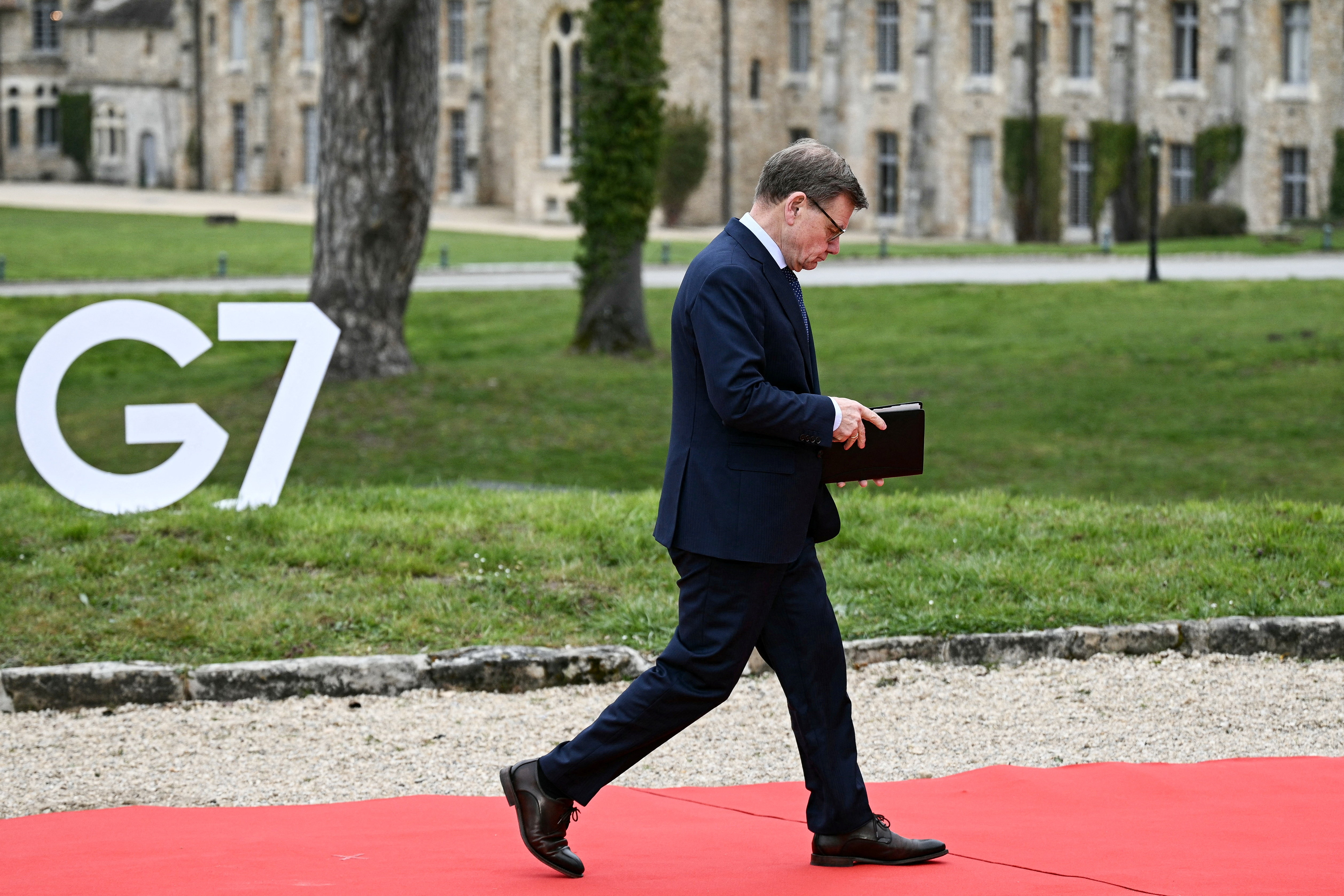 Germany's Foreign Minister Johann Wadephul arrives for a G7 Foreign Ministers' meeting at the Vaux-de-Cernay Abbey in Cernay-la-Ville outside Paris, France, March 27, 2026.   BRENDAN SMIALOWSKI/Pool via REUTERS