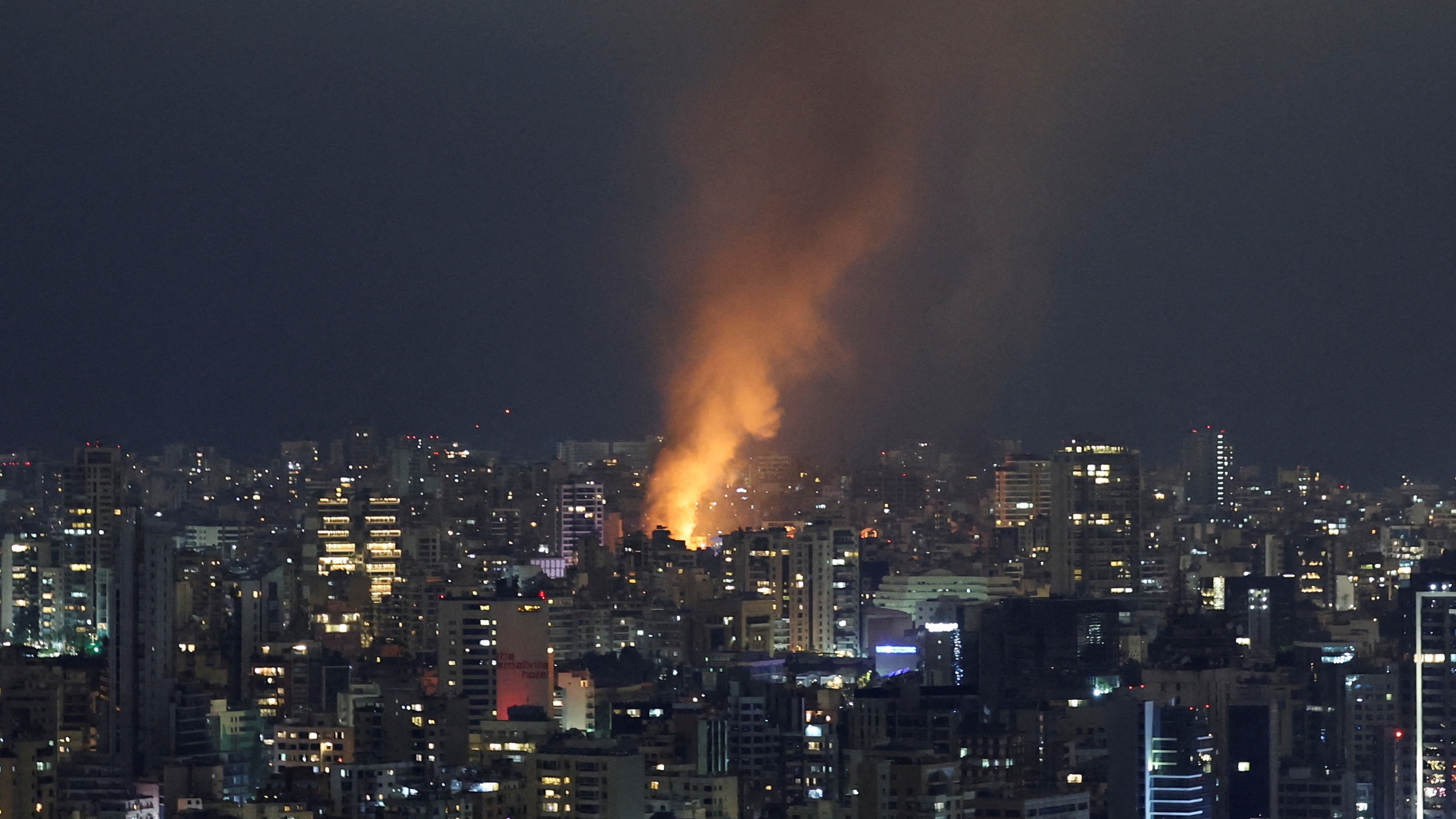 Smoke and fire rise over Beirut, after Israeli air strikes, amid ongoing hostilities between Hezbollah and Israeli forces, as seen from Sin El Fil, Lebanon, October 10, 2024. REUTERS/Amr Abdallah Dalsh