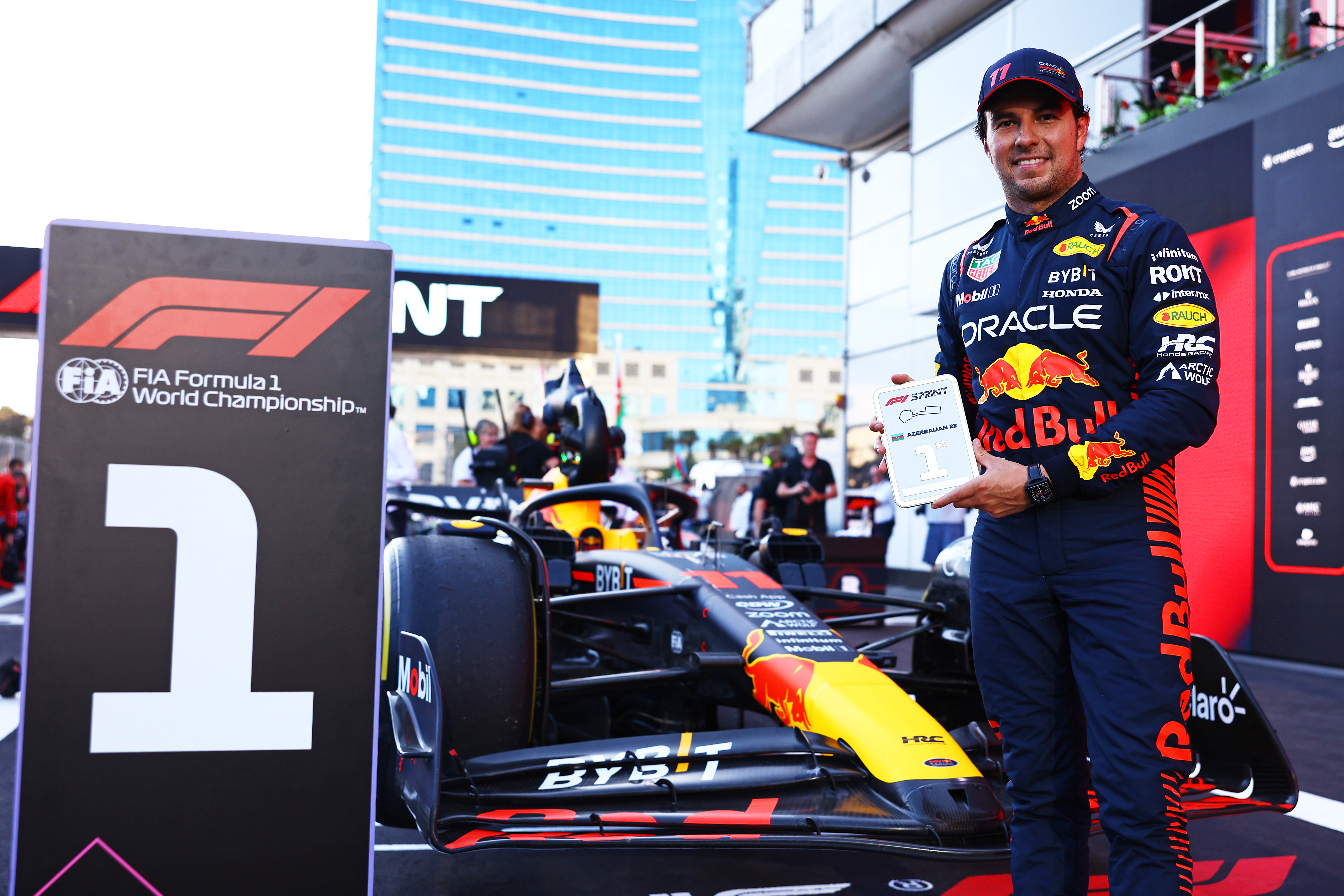 BAKU, AZERBAIJAN - APRIL 29: Sprint winner Sergio Perez of Mexico and Oracle Red Bull Racing celebrates in parc ferme  during the Sprint ahead of the F1 Grand Prix of Azerbaijan at Baku City Circuit on April 29, 2023 in Baku, Azerbaijan. (Photo by Mark Thompson/Getty Images)