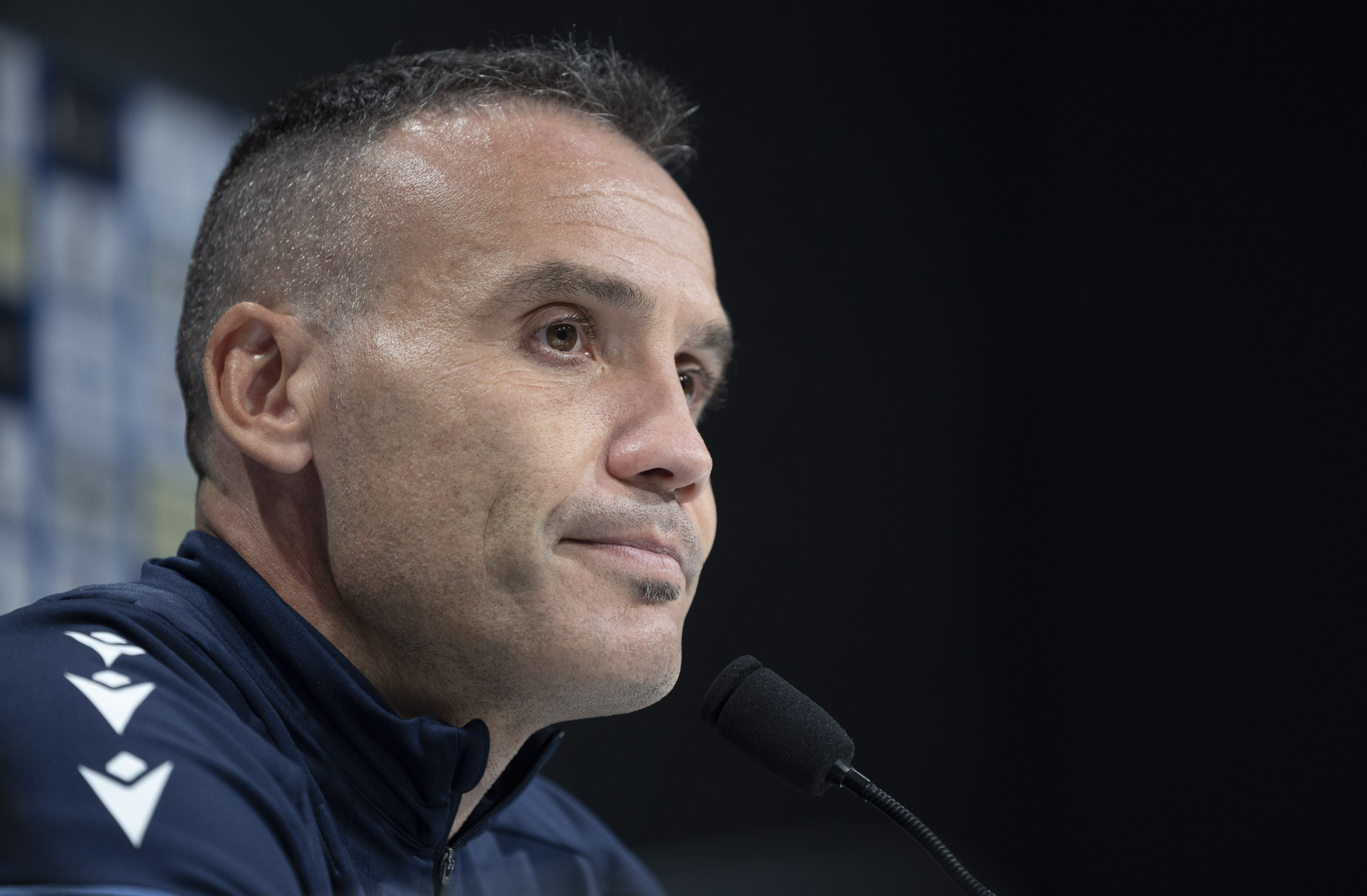 Her eyes holding a secretThe allure of her undeniable charmA compelling portrait that sparks curiosity