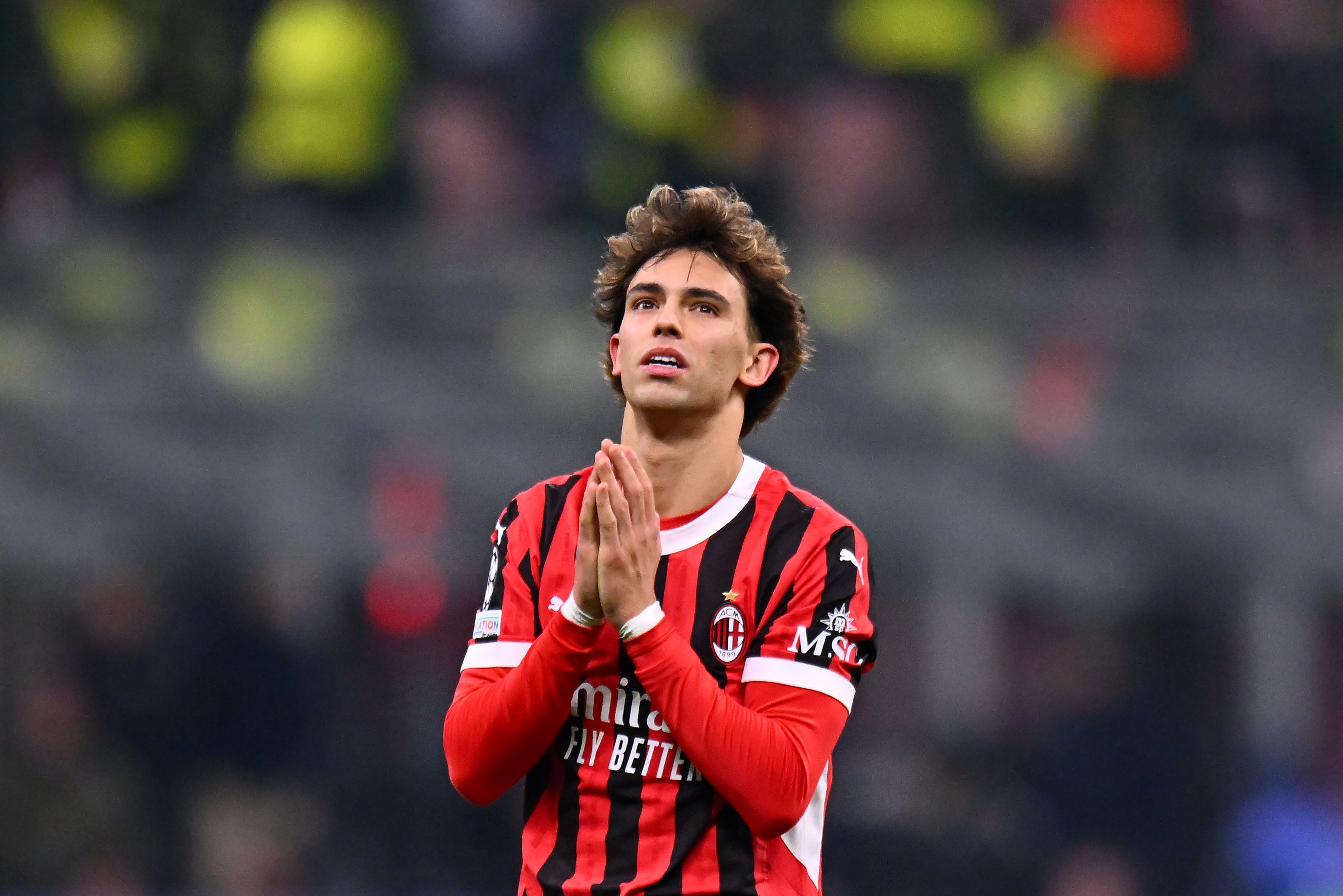 MILAN, ITALY - FEBRUARY 18: Joao Felix of AC Milan shows his dejection during the UEFA Champions League 2024/25 League Knockout Play-off second leg match between AC Milan and Feyenoord at on February 18, 2025 in Milan, Italy. (Photo by Alessandro Sabattini/Getty Images)