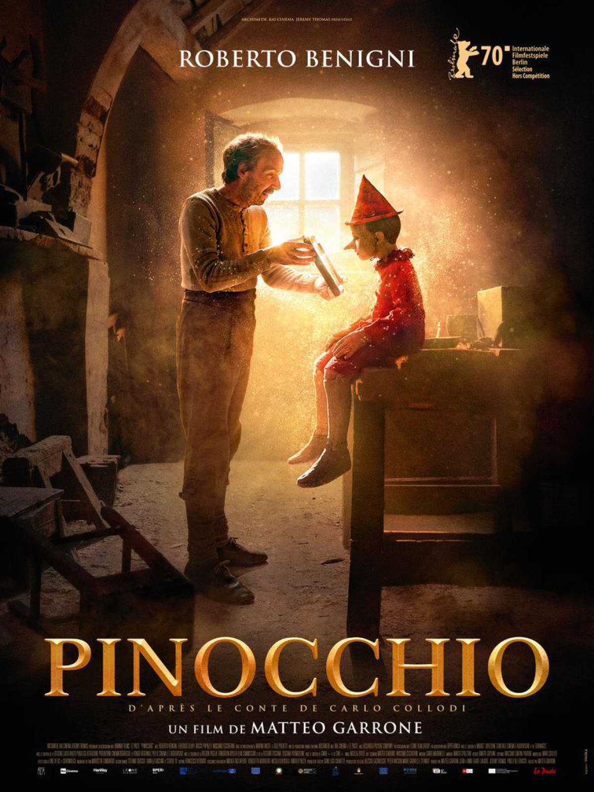 Roberto Benigni (i) en el cartel promocional de &#039;Pinocho&#039;