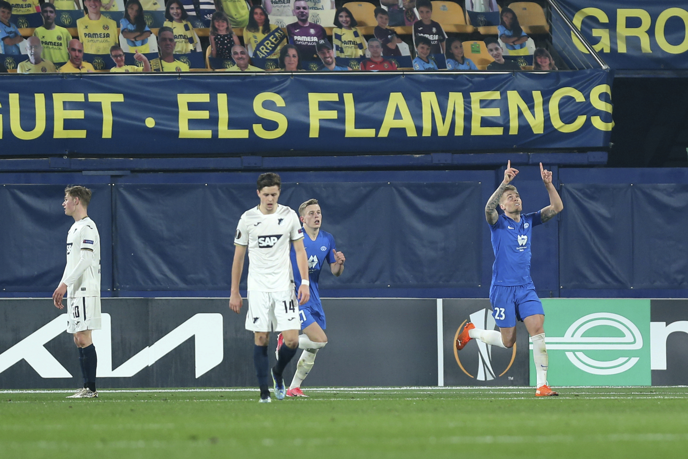 Molde's Eirik Ulland Andersen, right, celebrates scoring his side's second goal during the Europa League round of 32 first leg soccer match between Molde and 1899 Hoffenheim at the Ceramica stadium in Villarreal, Spain, Thursday, Feb. 18, 2021. (AP Photo/Alberto Saiz)