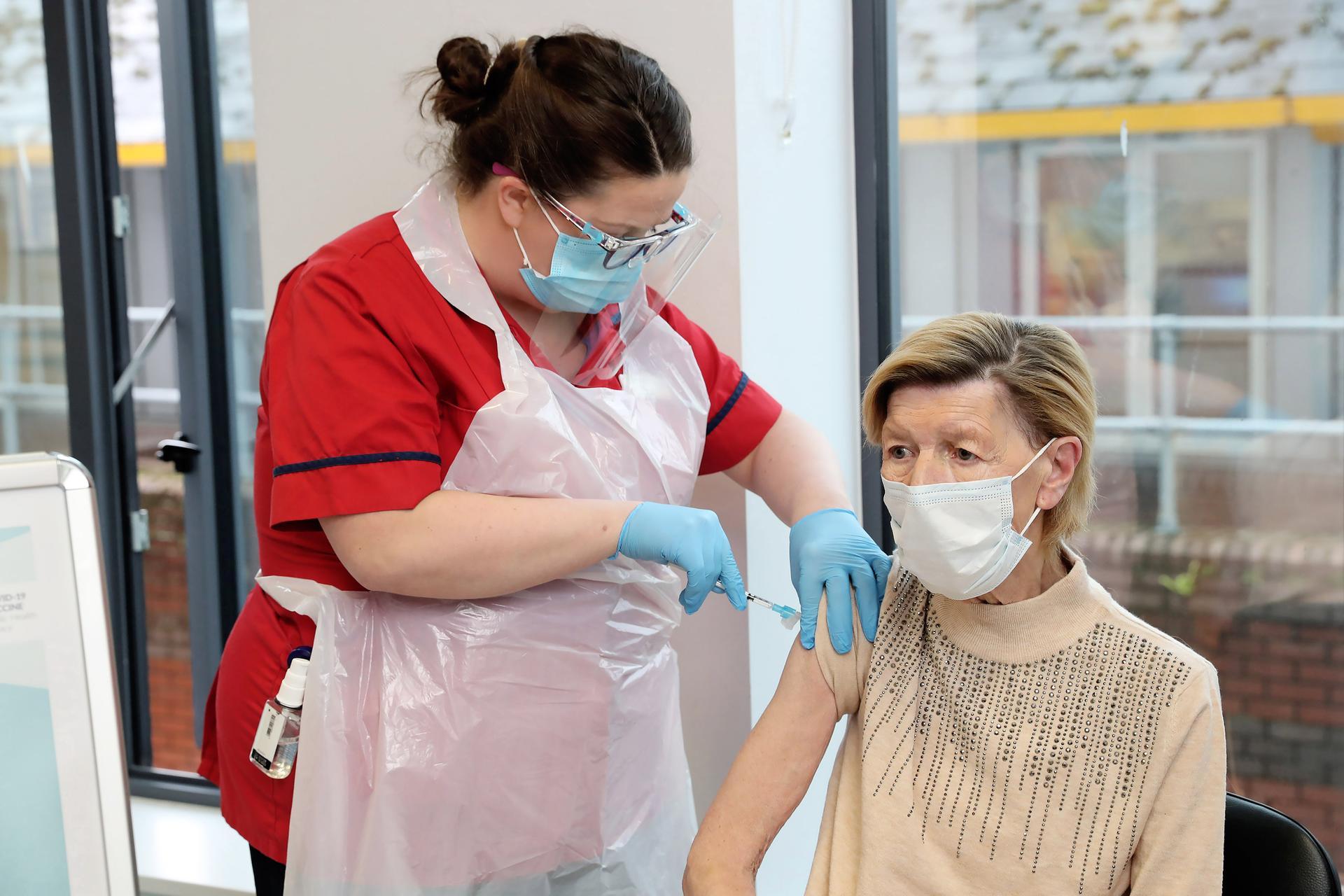 Annie Lynch, the first person to receive the Pfizer-BioNTech Covid-19 vaccine in Ireland, receives the second dose in Dublin on January 19. AFP