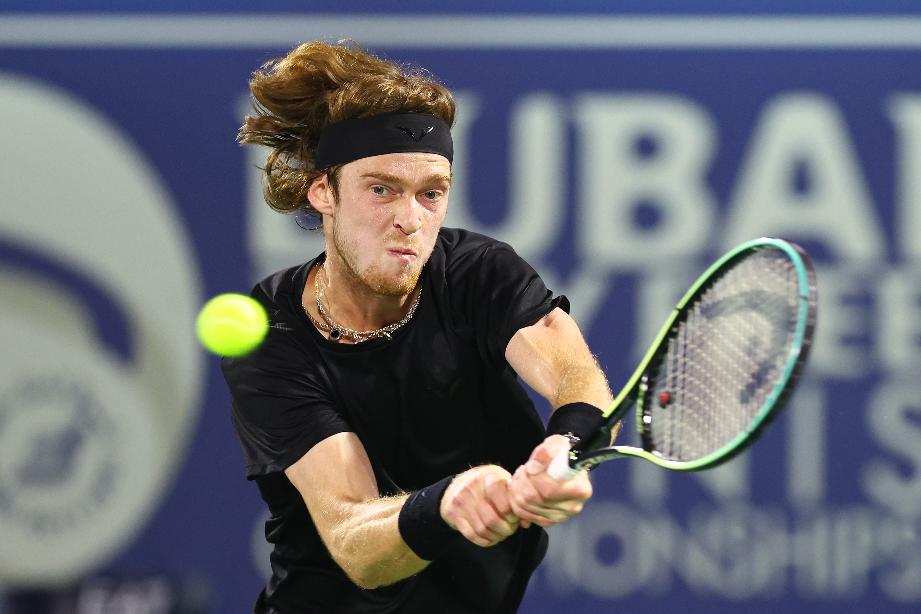 DUBAI, UAE, 4th March 2023. 2022 champion Andrey Rublev in action during  the men's singles final of the Dubai Duty Free Tennis Open Championships.  3rd seed Daniil Medvedev defeated Rublev 6-2, 6-2