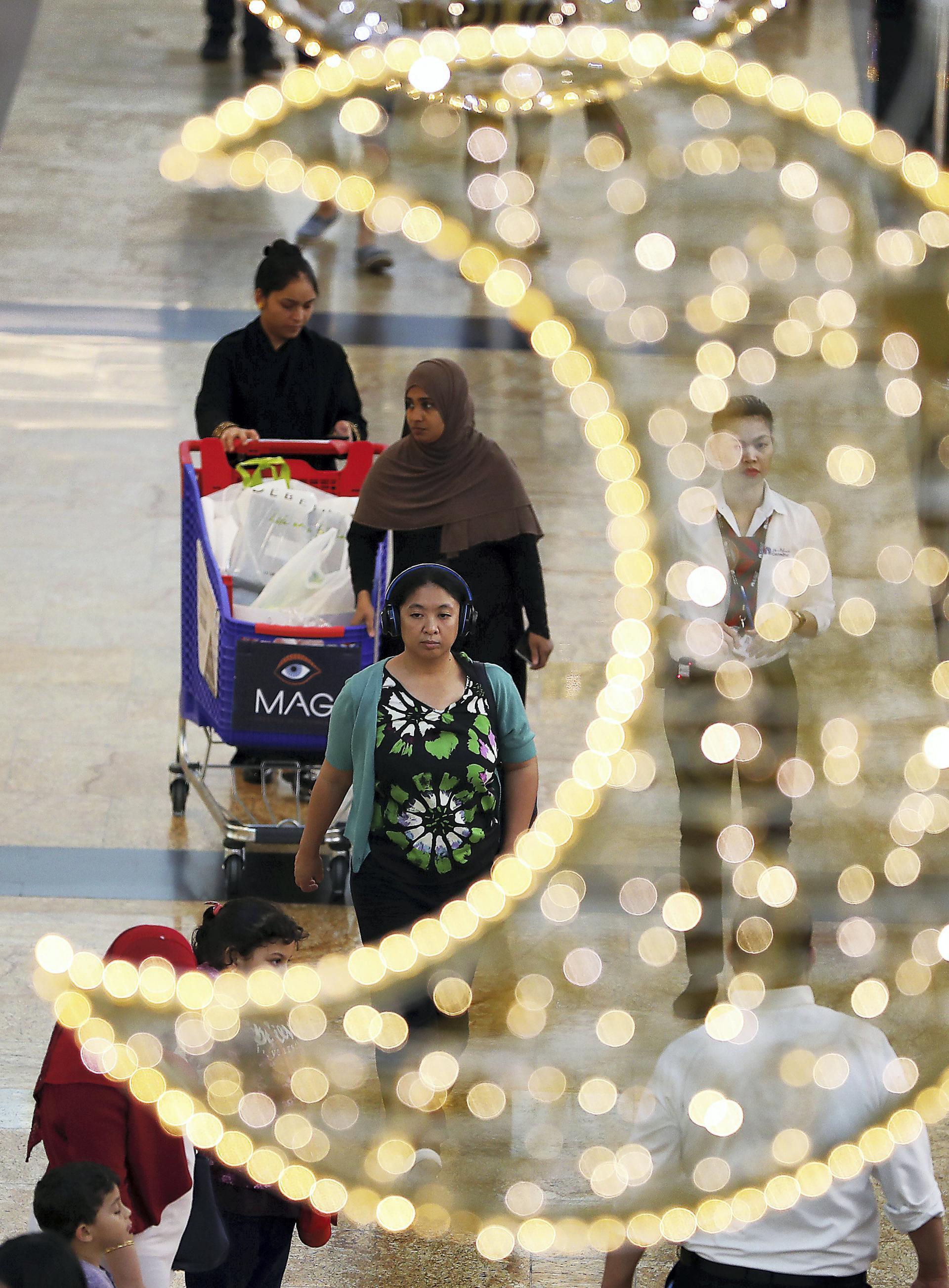 People shopping at Carrefour Hypermarket at Mall of the Emirates in Dubai ahead of Eid Al Fitr. Pawan Singh / The National