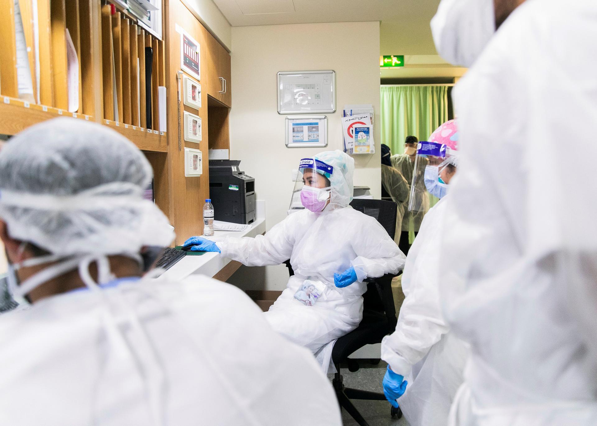 Healthcare workers at the emergency ward in Sheikh Khalifa Medical City. The President, Sheikh Khalifa, has paid tribute to the frontline workers who helped to curb Covid-19. Reem Mohammed / The National
