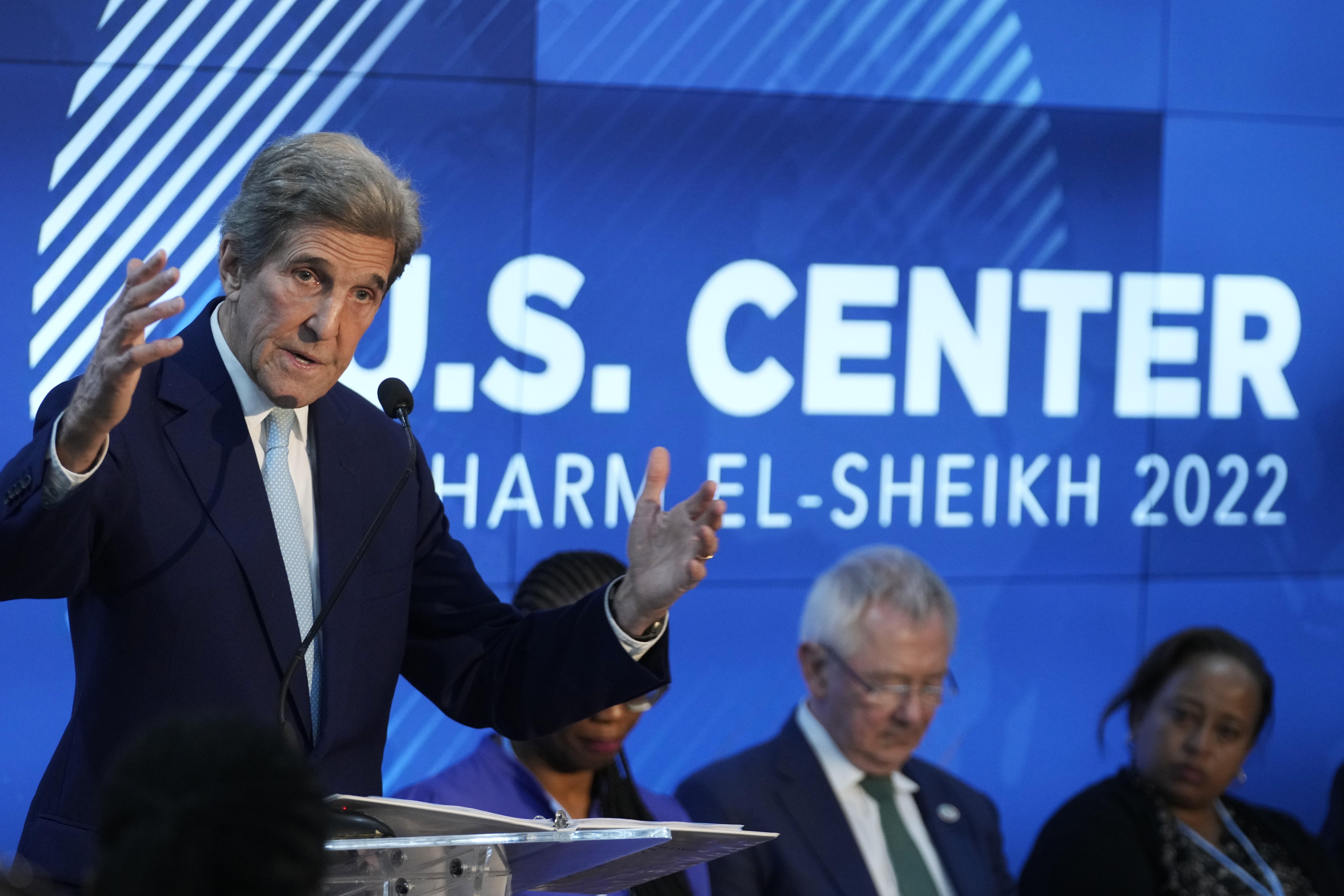 Mr Kerry speaks during a session on accelerating the clean energy transition in developing countries. AP