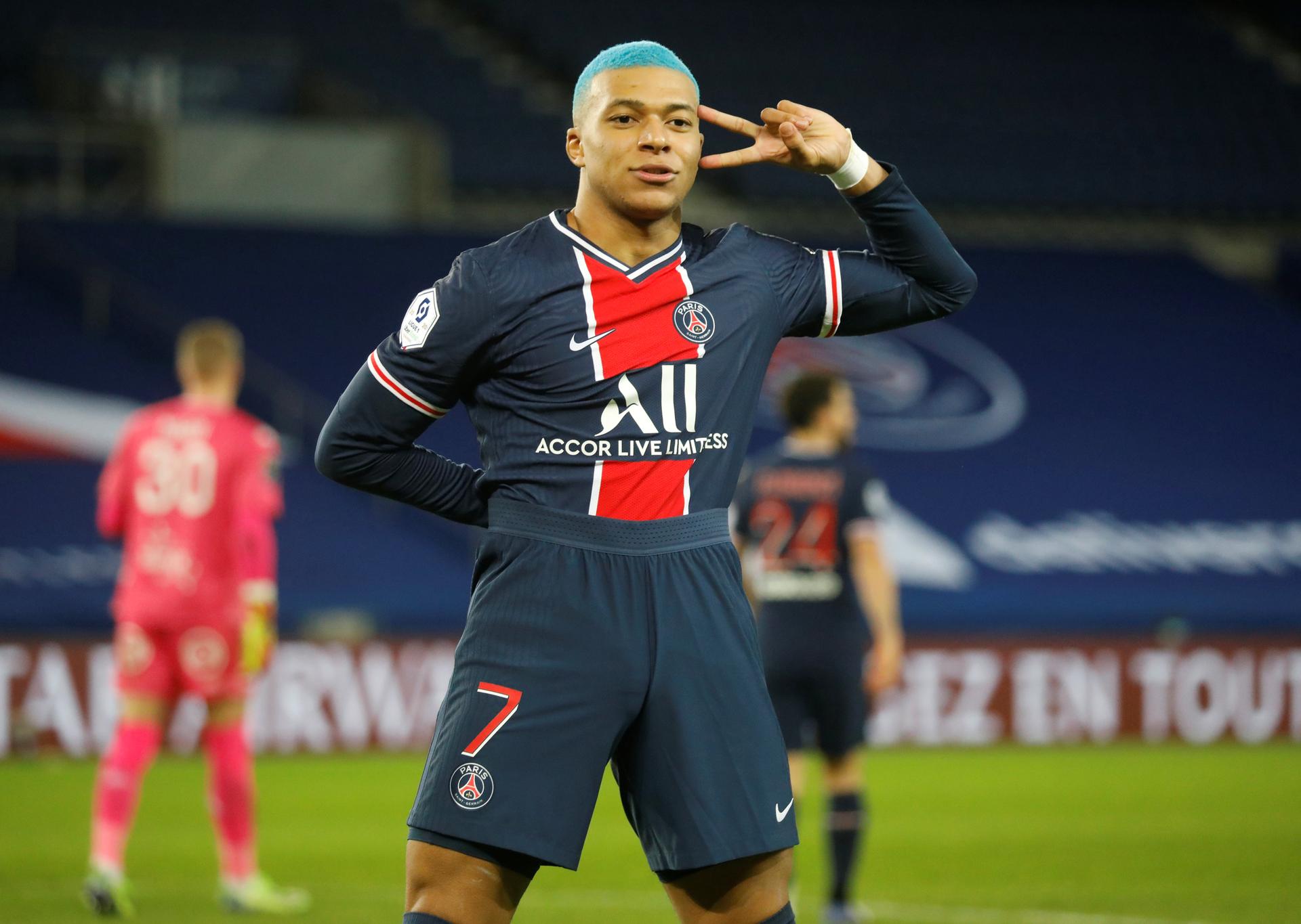 Allez Les Bleus! Kylian Mbappe sports dramatic new hairstyle as he helps  champions PSG keep pace at the top - in pictures