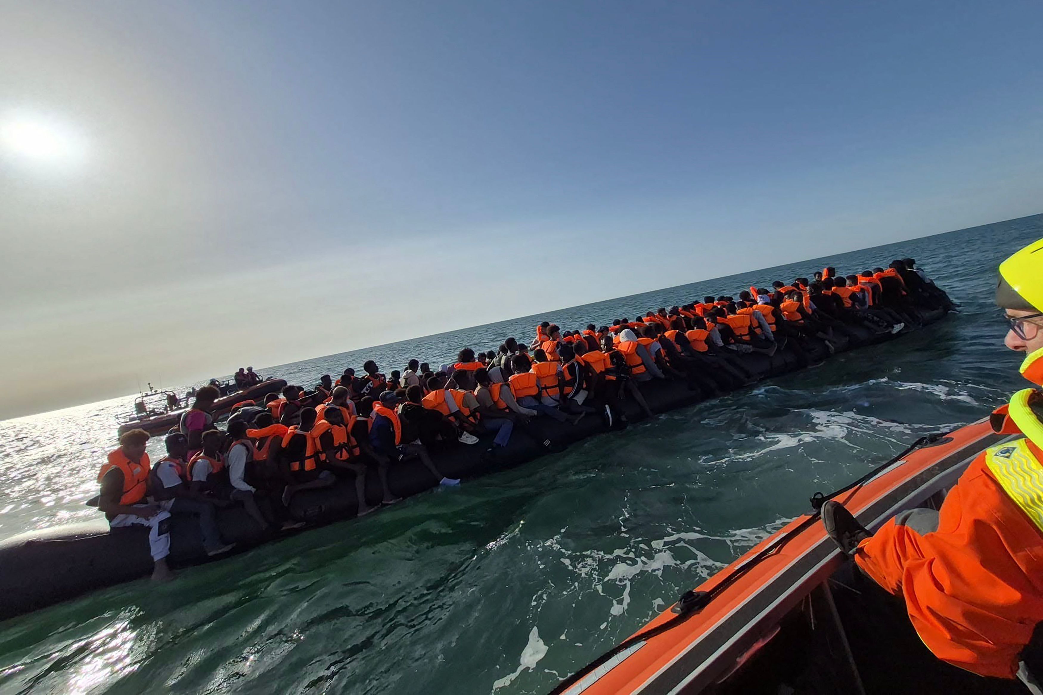 Mega dinghy' carrying 230 migrants across Channel shows crackdown is working, says UK minister | The National