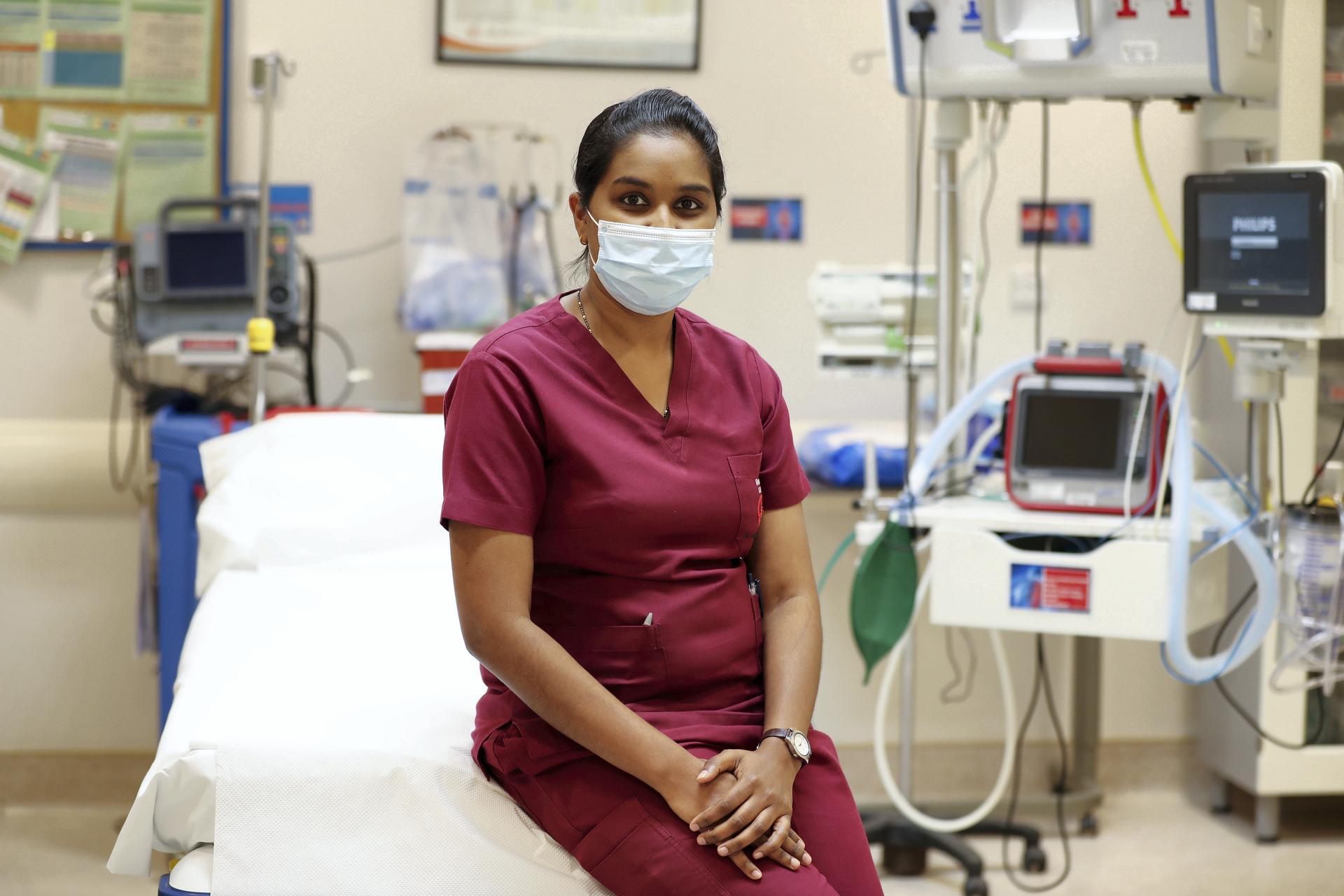 Nurse Renu Venugopal, who contracted Covid-19, recovered and continued to treat patients at Al Zahra Hospital, Sharjah. Chris Whiteoak / The National