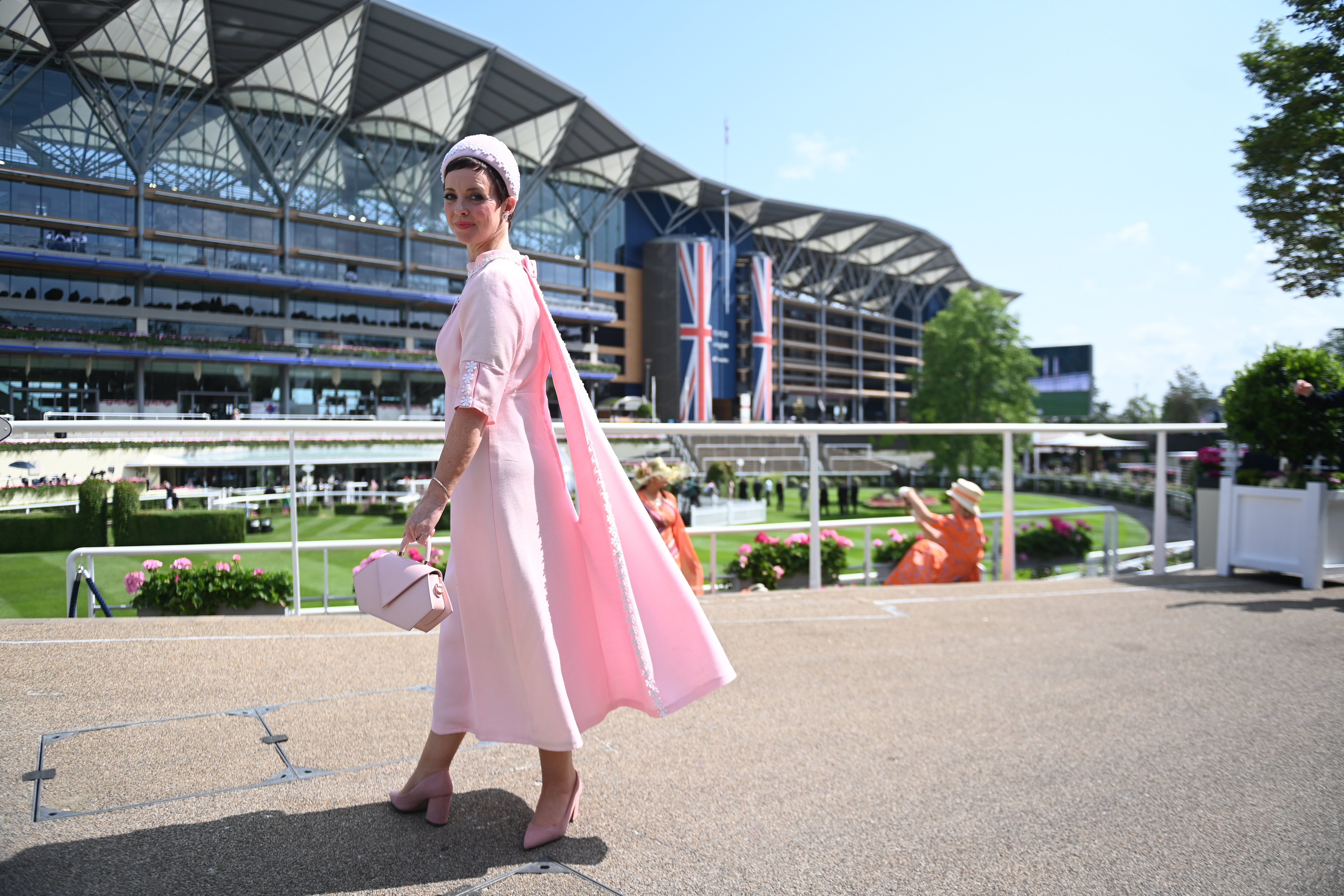 Princess Anne restyles red beret and other wardrobe staples as chic  racecourse attire