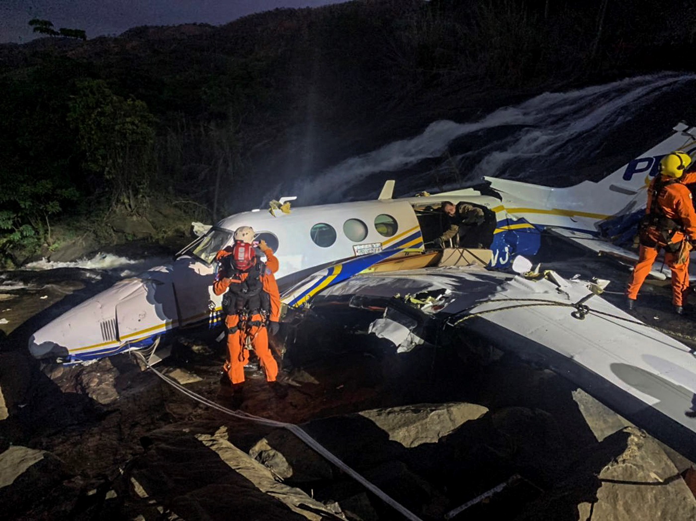 The wreckage of a small airplane that crashed with Brazilian country singer  Marilia Mendonca, 26, aboard lies near a waterfall area in Piedade de  Caratinga, state of Minas Gerais, Brazil, November 5