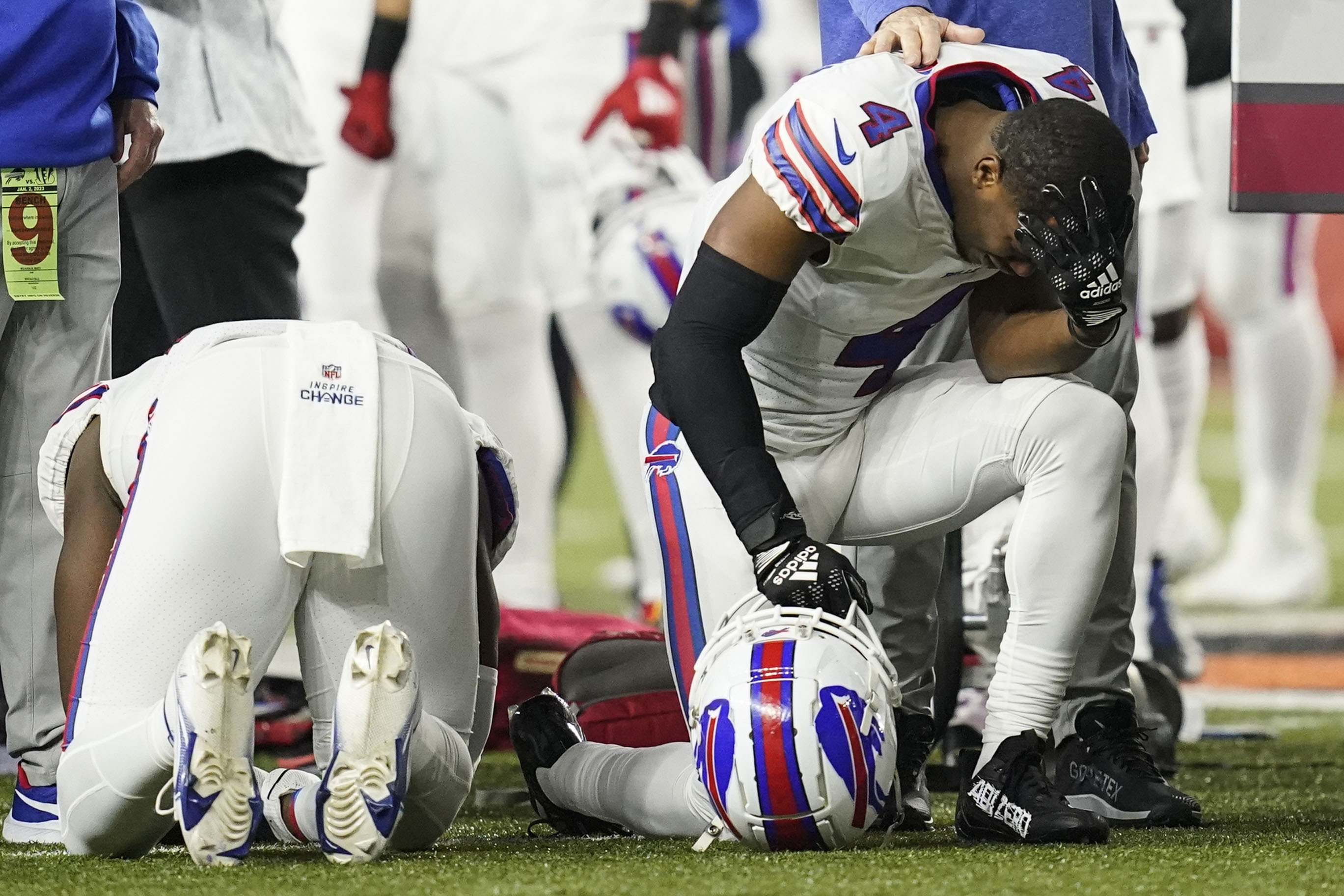 Examining football's health risks after Damar Hamlin's cardiac arrest on  the field