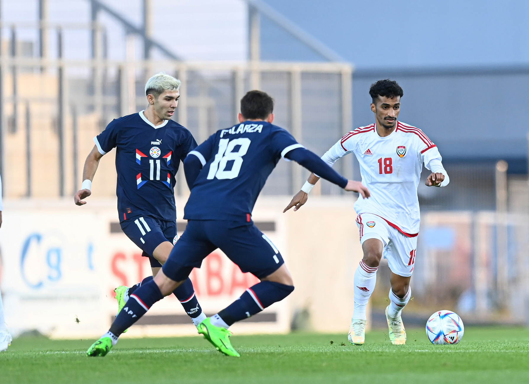 Abdullah Ramadan runs with the ball during the UAE's friendly against Paraguay. Photo: UAE FA