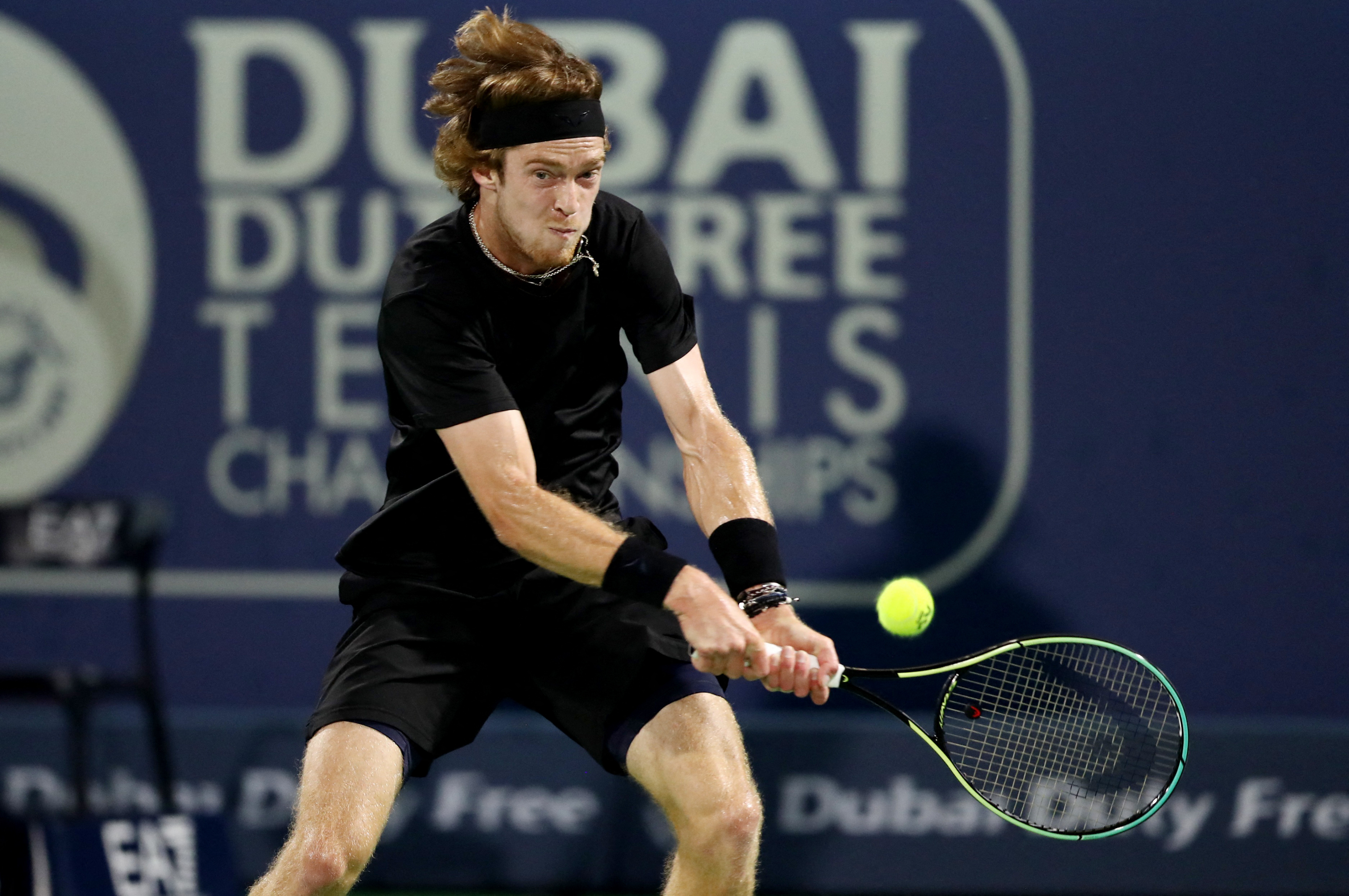 DUBAI, UAE, 4th March 2023. 2022 champion Andrey Rublev in action during  the men's singles final of the Dubai Duty Free Tennis Open Championships.  3rd seed Daniil Medvedev defeated Rublev 6-2, 6-2