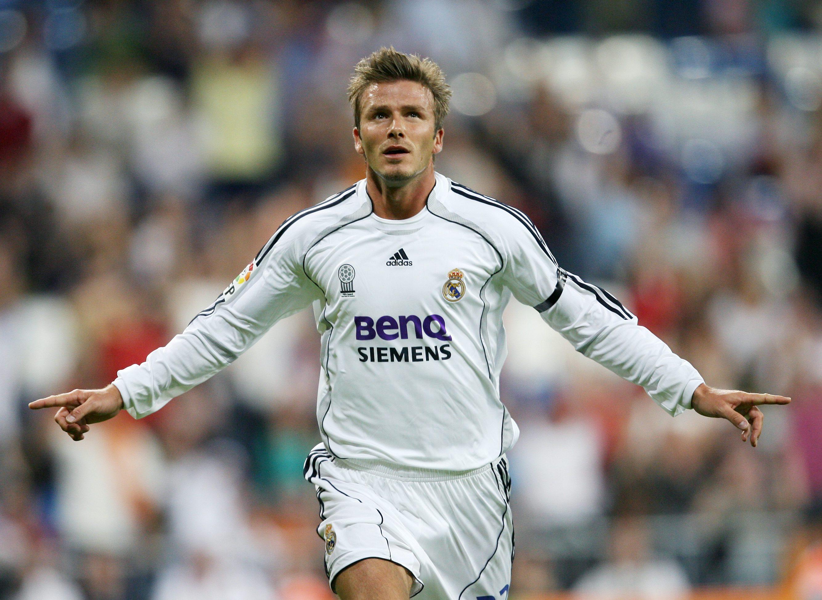 British and New PSG football player David Beckham poses with his PSG Football  shirt after his PSG signature at the Parc des Princes stadium in Paris,  France on January 31, 2013. Beckham