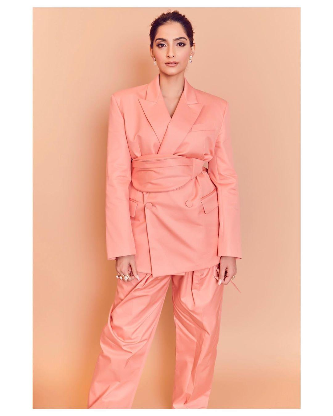 Rihanna Pink Suit and Fanny Pack