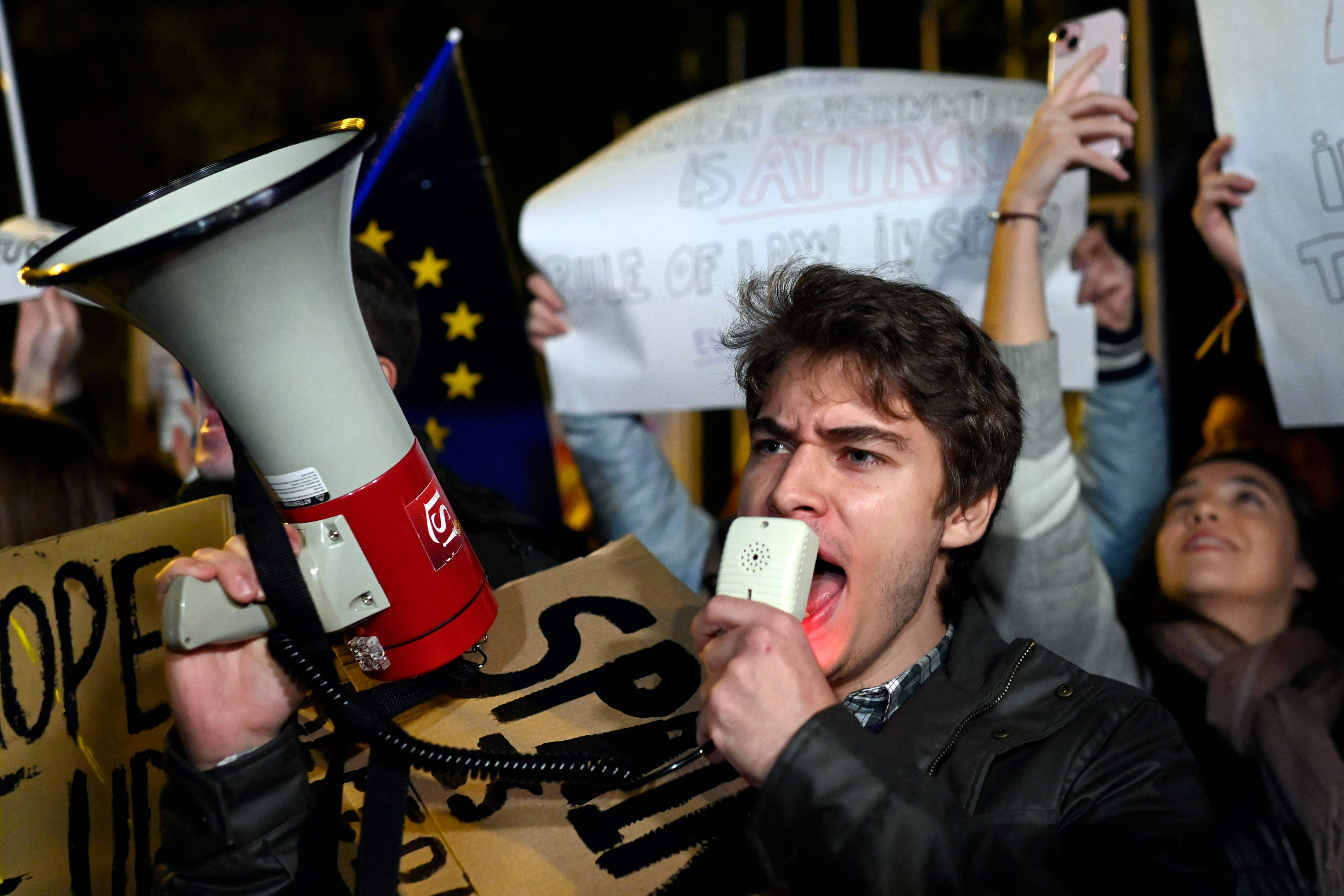 Exiled Catalan leader sets tough terms for talks on Spain's new PM