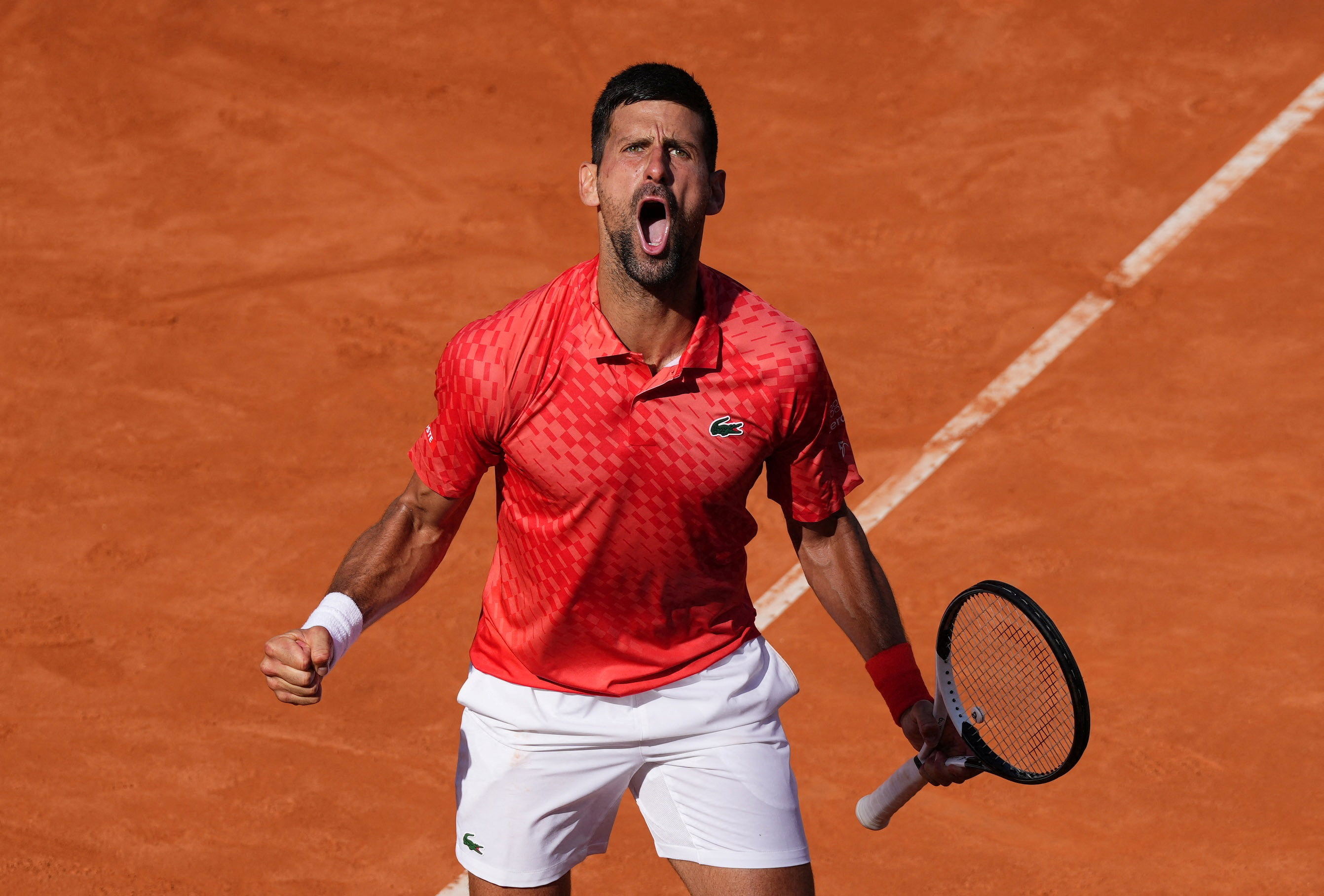 Djokovic tested by Etcheverry in opening Italian Open win; Swiatek cruises