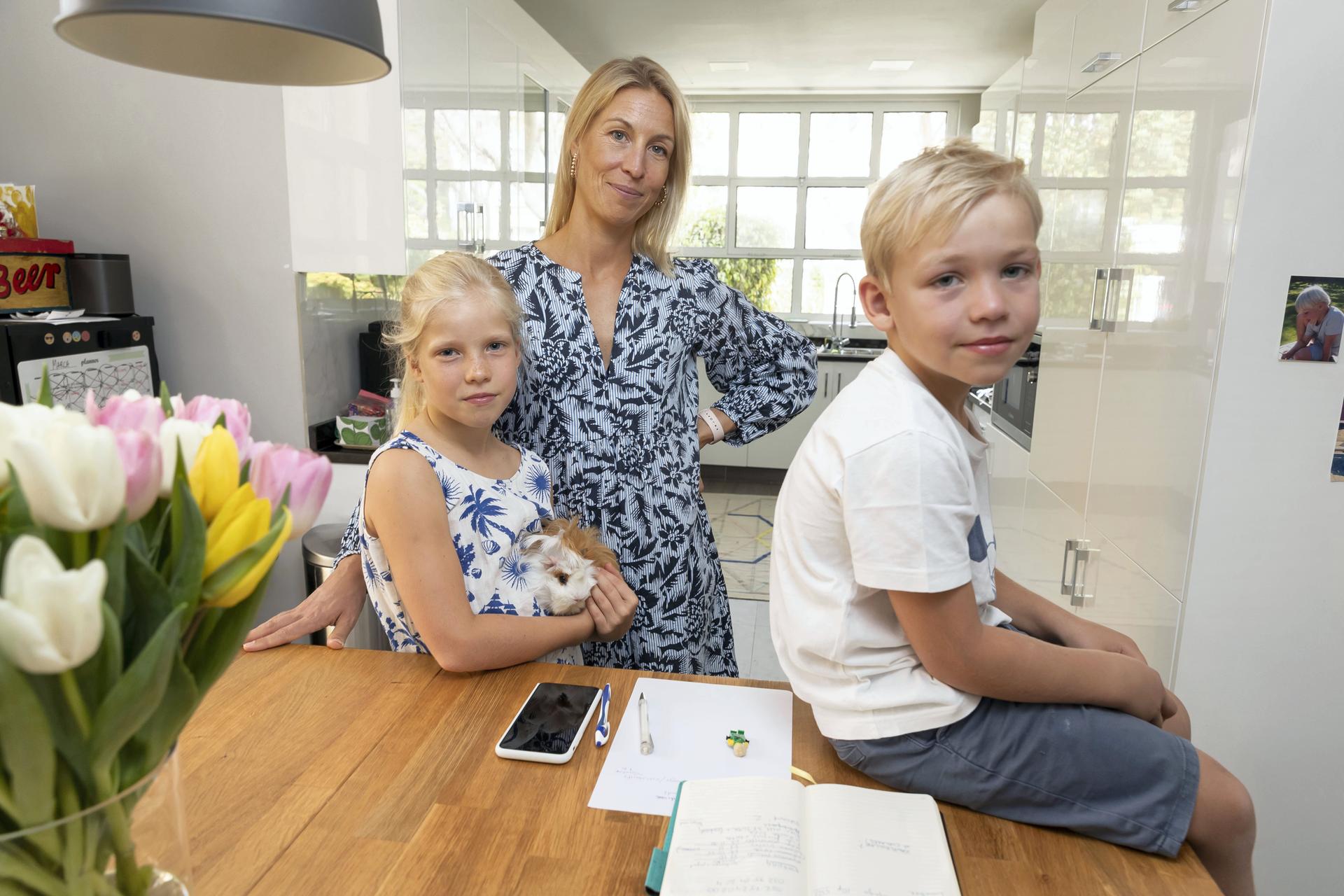 Mother-of-three, Clara Cloché, says she suffered from parental burnout last year. Here she is pictured with two of her three children, seven-year-old Lea, left, and Noah, 6. Photos by Antonie Robertson / The National